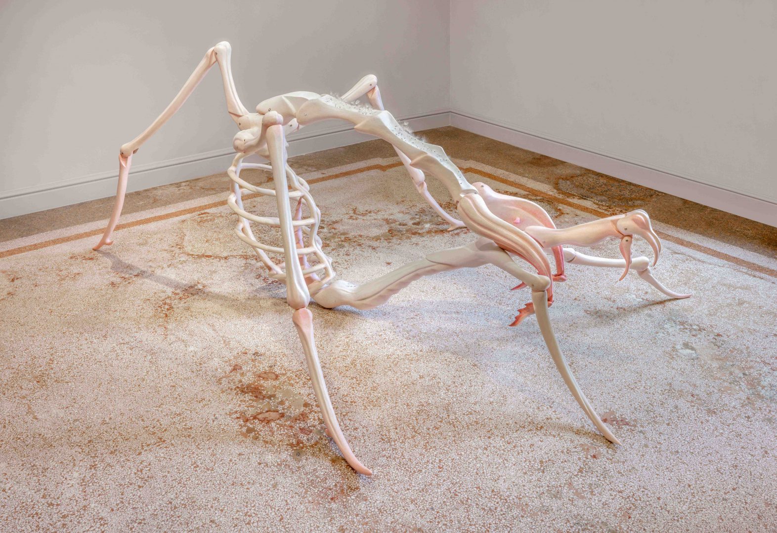 Liao Wen, Tears of Succubus, 2024. Hand-carved and painted limewood, stainless- steel, Metaplexis japonica seeds, 118 x 288 x 210 cm. Installation view of By Devouring It, I Learn about the World at Capsule Venice, 21 September – 15 December 2024. Courtesy of the Artist and Capsule. Photo by Andrea Rossetti.