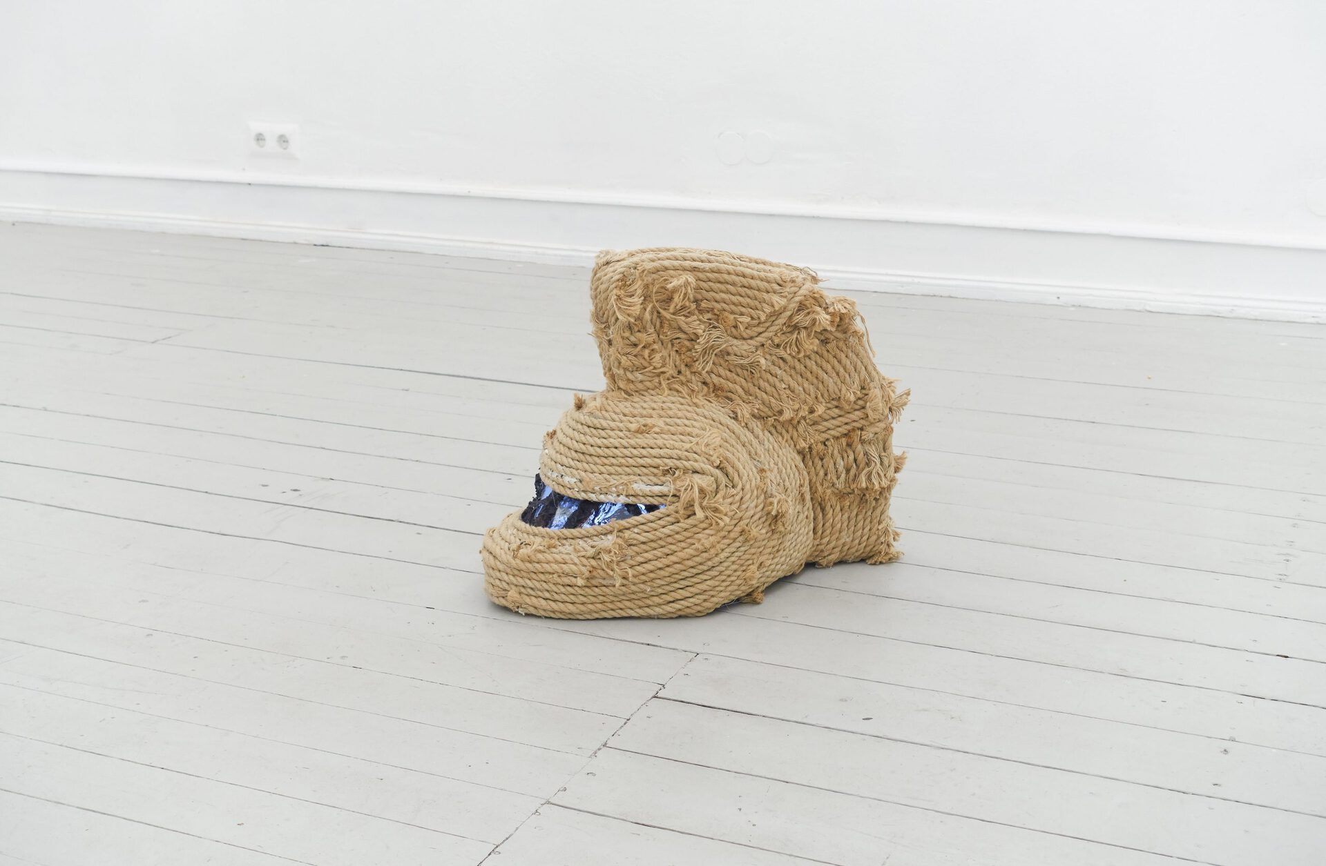 Bernhard Holaschke, Protection had to be given (Rope), 2019, Helmet and rope, 43 x 60 x 30 cm