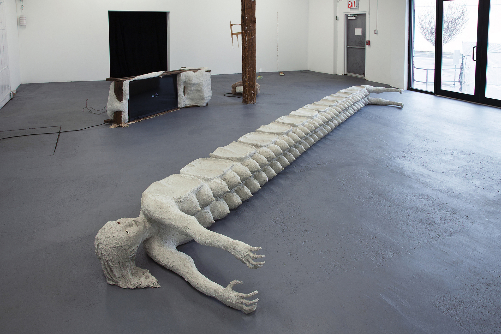 bitch bench 2018 steel, polystyrene, plaster, Celluclay, wood, acrylic, epoxy resin 14 x 227 x 37 inches