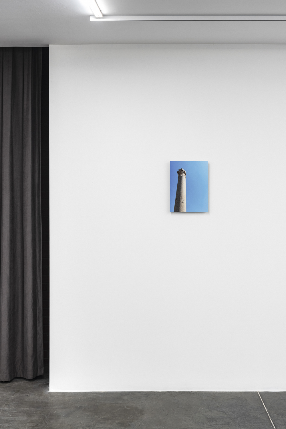 Berkay Tuncay, Smiley Column, 2017, Digital inkjet print on photo paper, mounted on aluminium, 40 x 30 cm