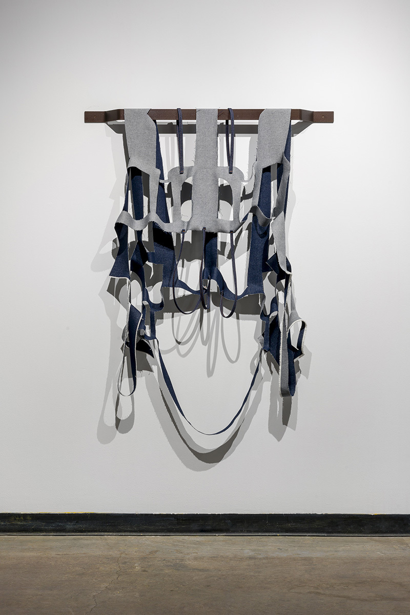 Karen Kraven, Indigo, 2020, Denim, thread and powder coated steel bracket