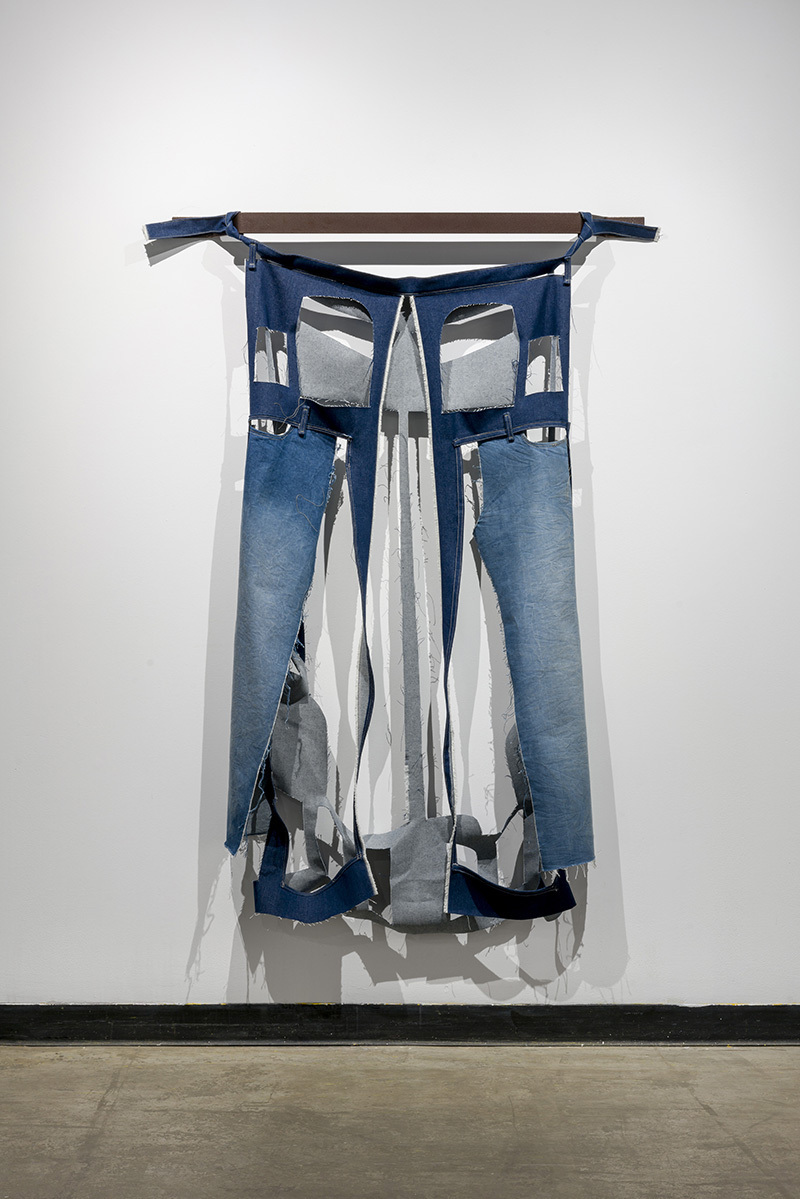 Karen Kraven, Pumice, 2020, Denim, thread and powder coated steel bracket