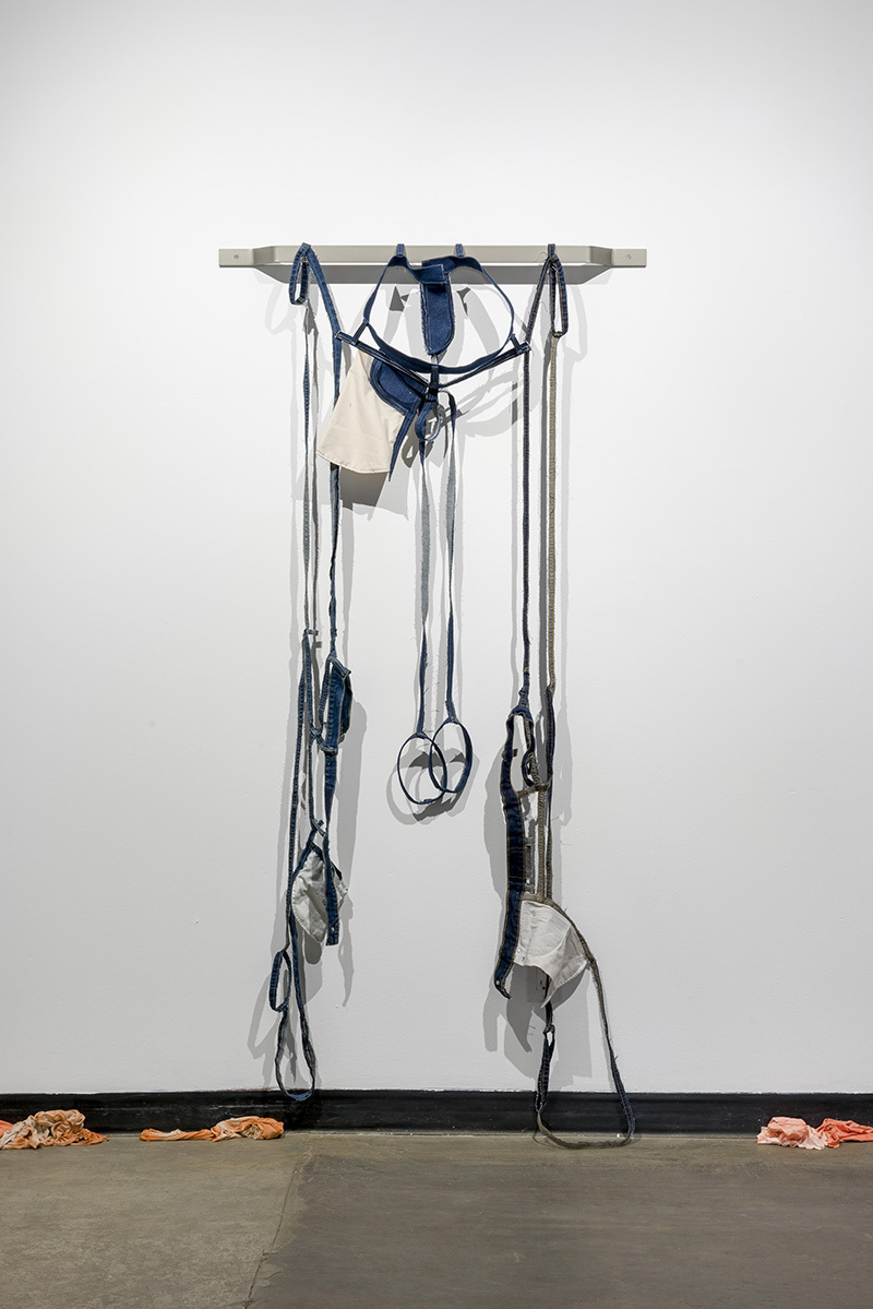 Karen Kraven, Welt, 2020, Denim, cotton, thread and powder coated steel bracket
