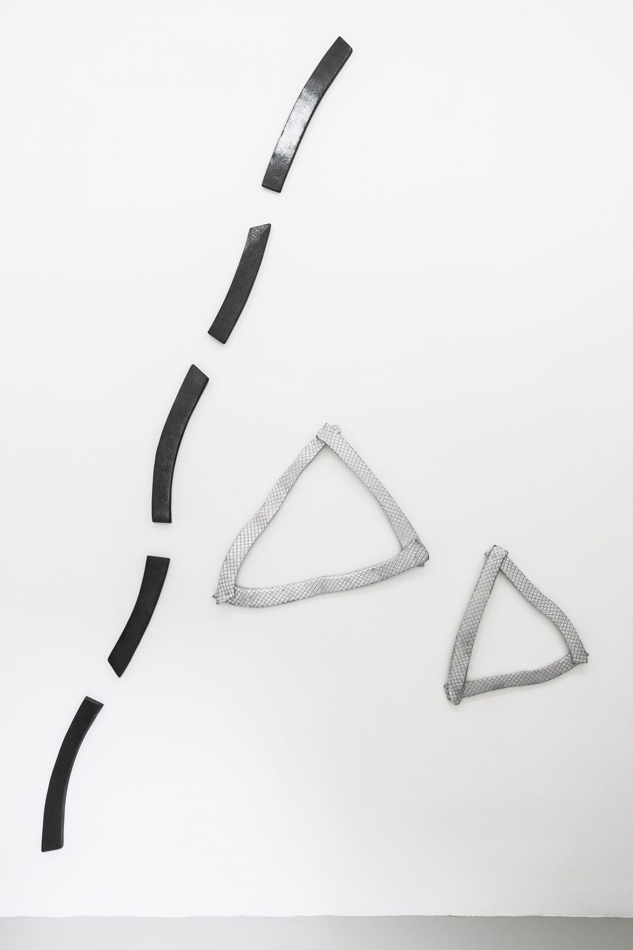 Bernhard Walter, "Heavy metallic", wood, fabric, 2009; "Triangular Silvered Pieces", wood, fabric, 62 x 82 cm, 60 x 51 cm, 2009