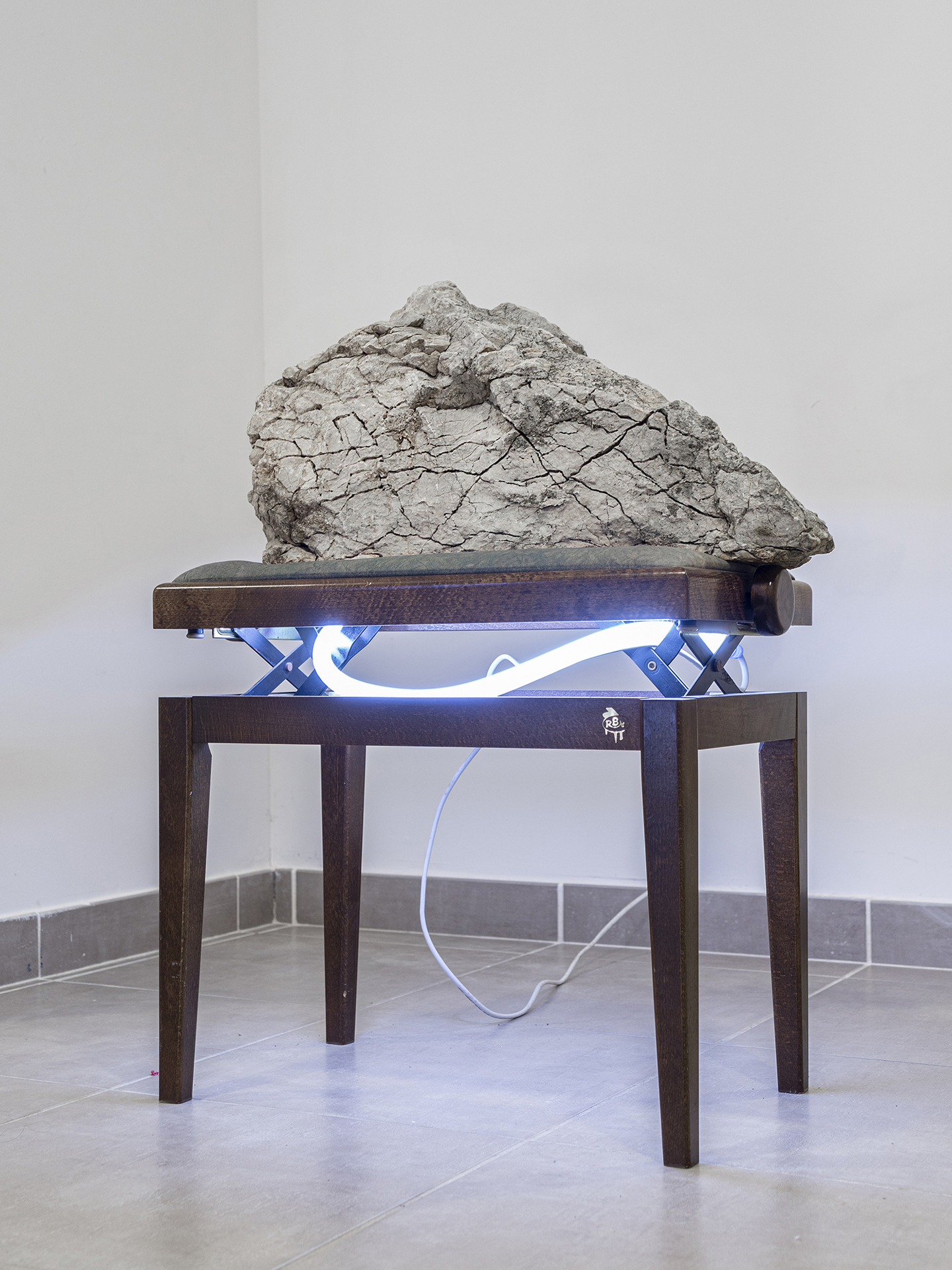 Léo Fourdrinier, Collision (In Solitude Of Memory), 2020, limestone, led, wood, jack socket, variable dimensions