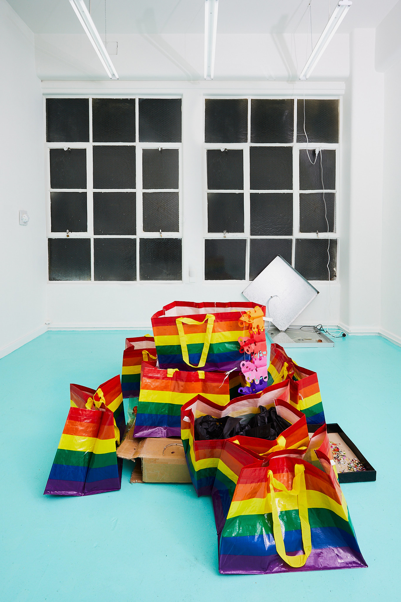 Spencer Lai Untitled, 2020 IKEA 'Storstomma' pride bags, cardboard, tissue paper, party supplies and decorations, fabricated weaponry, tools, antique puppets