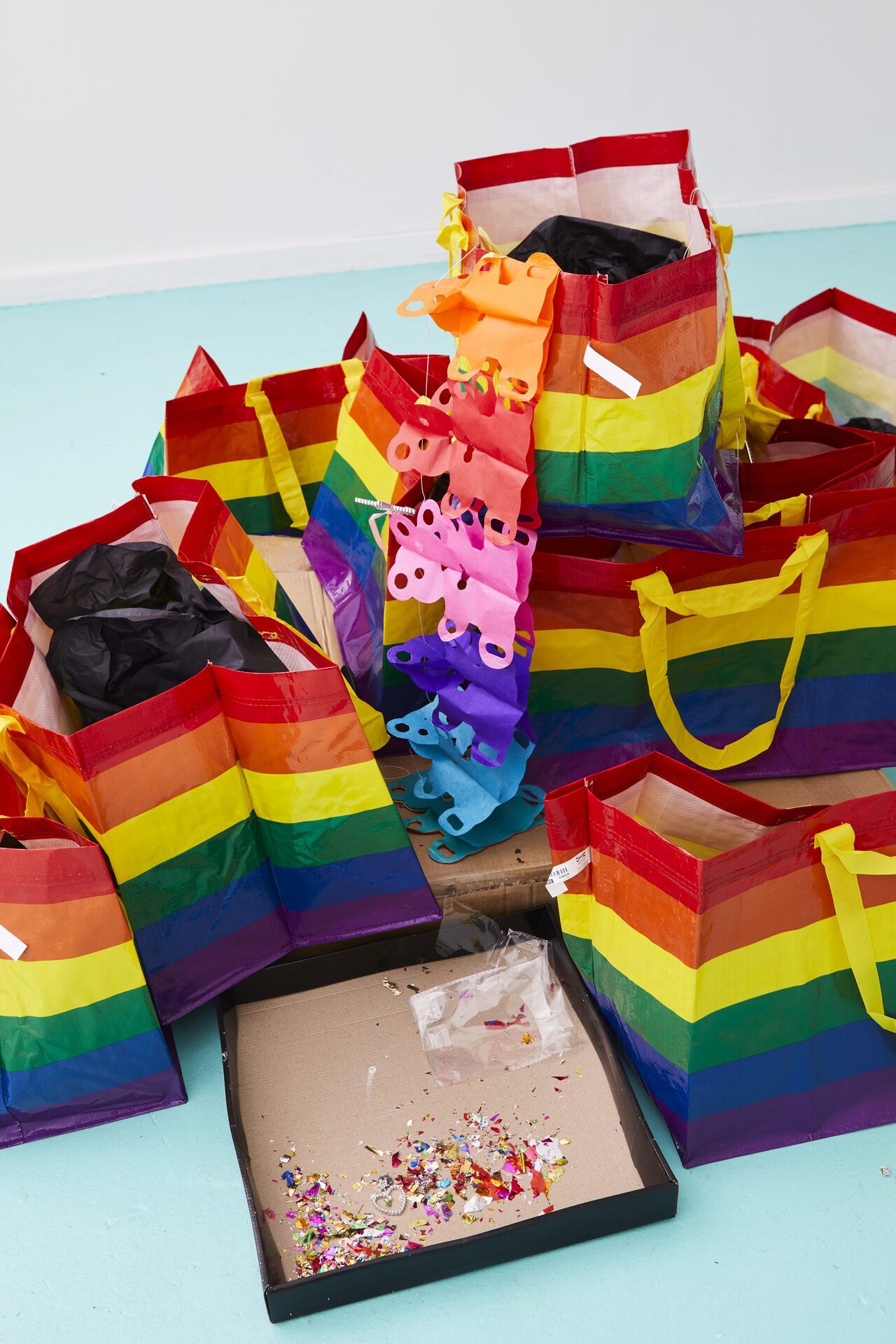 Spencer Lai Untitled, 2020 IKEA 'Storstomma' pride bags, cardboard, tissue paper, party supplies and decorations, fabricated weaponry, tools, antique puppets