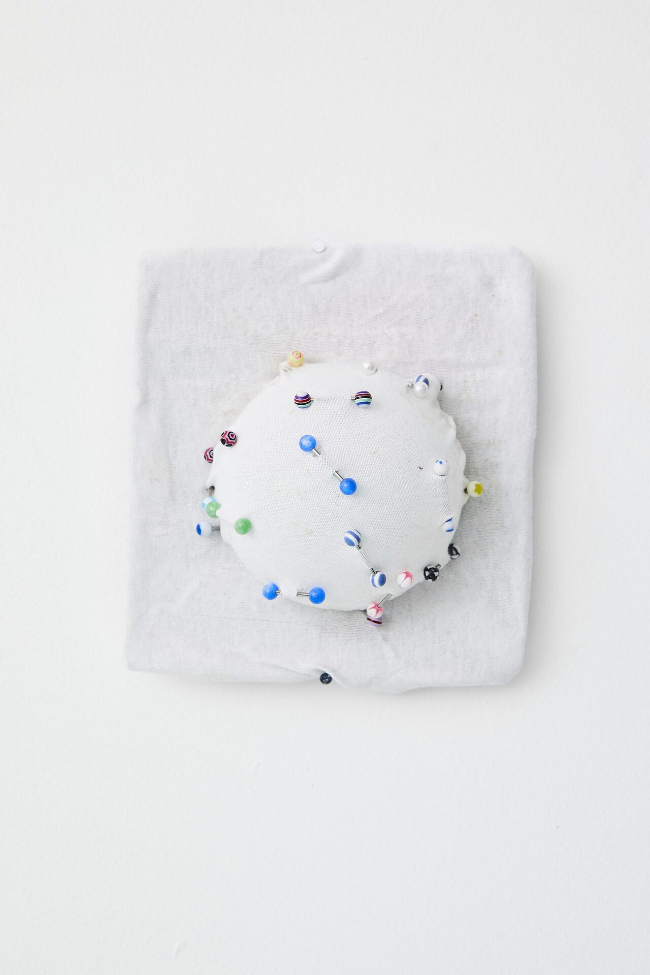 Victoria Todorov Title not known, 2019 Poly cotton, glue, tongue piercing barbells, plastic