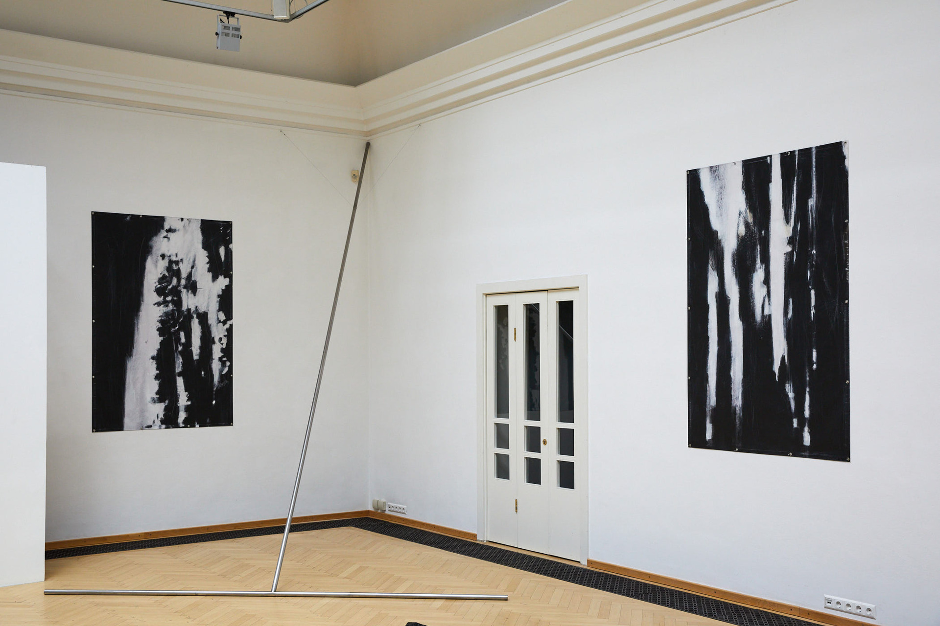 Meina Schellander T 2006, stainless steel, 560 x 330 x 6 cm Daniel Hosenberg land.schafft.spuren I and II, acrylic paint on PVC print, 200 x 135 cm