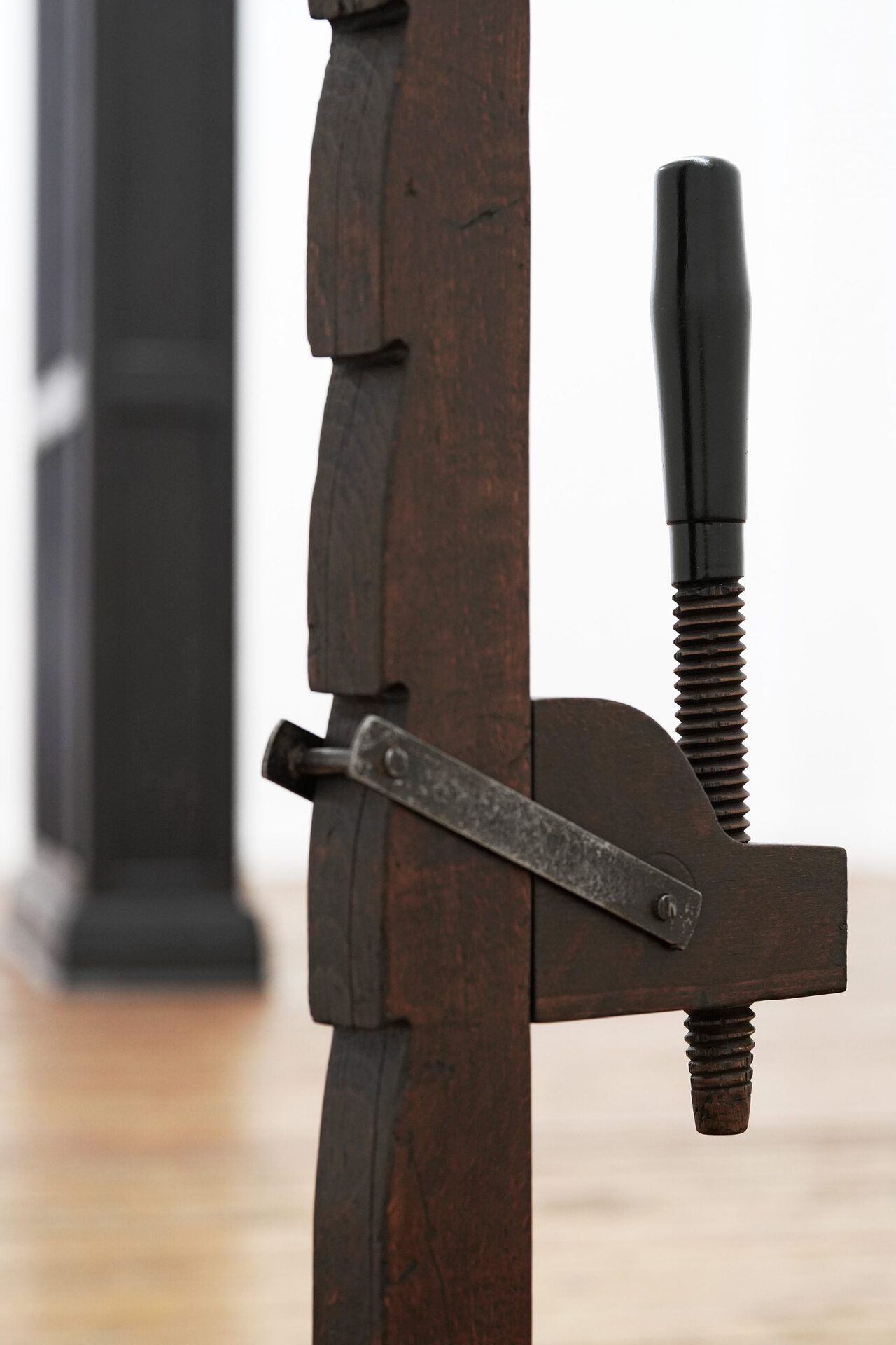 Eliza Ballesteros, CLAMPS (Detail), 2020, wood, oak stain, oil, iron, shellac, each 116 x 23 x 7 cm