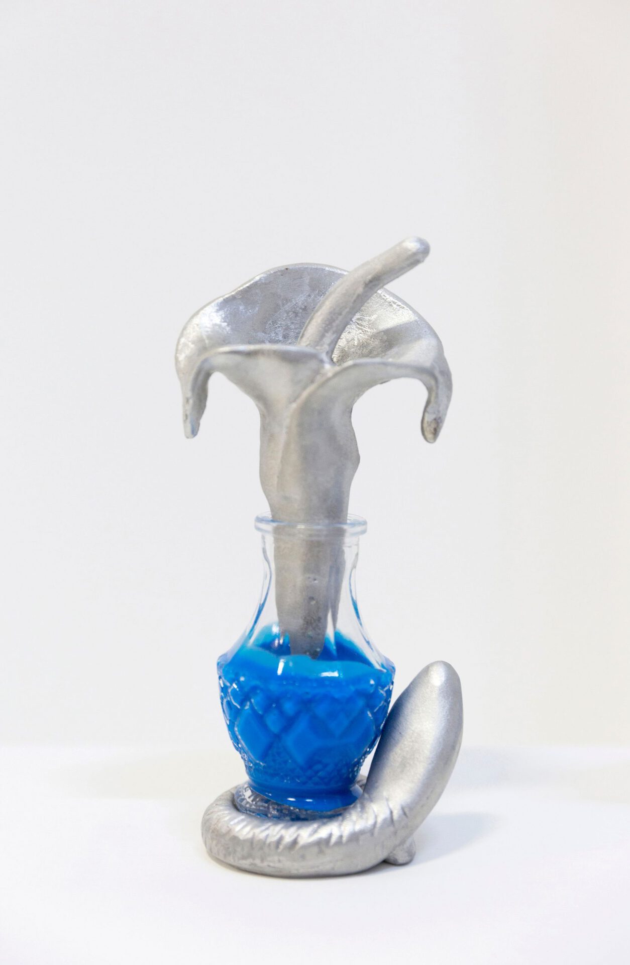 Amalia Vekri, Blue Spirulina Magic Mask, Edition of 10, Aluminum, glass, blue Spirulina, essential oils (apricot kernel, rosehip,olive oil), 2020