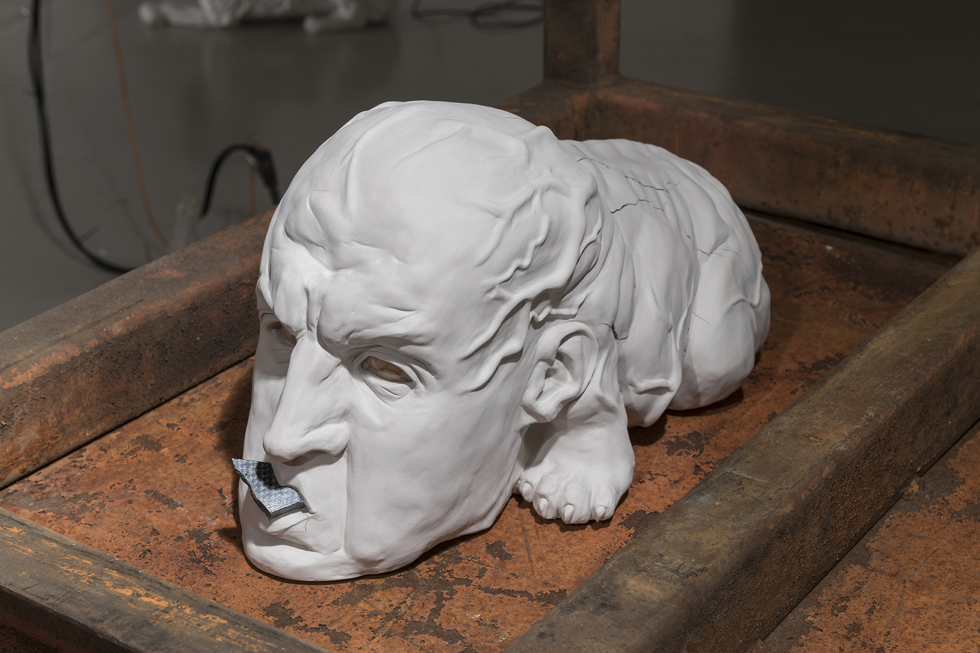 Guillermo Ros, Perro creador, 2020, Ceramic paste, marble, hydro printing and exhaust pipes