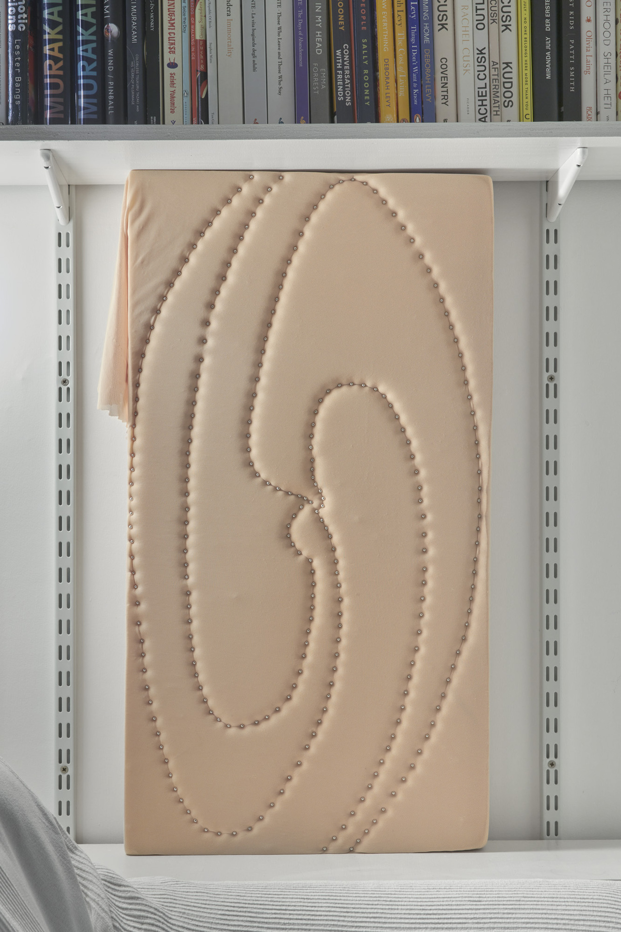 Daphne Ahlers - Depressions, 2020, PU foam, mesh, pins, pearls 30 x 80 cm