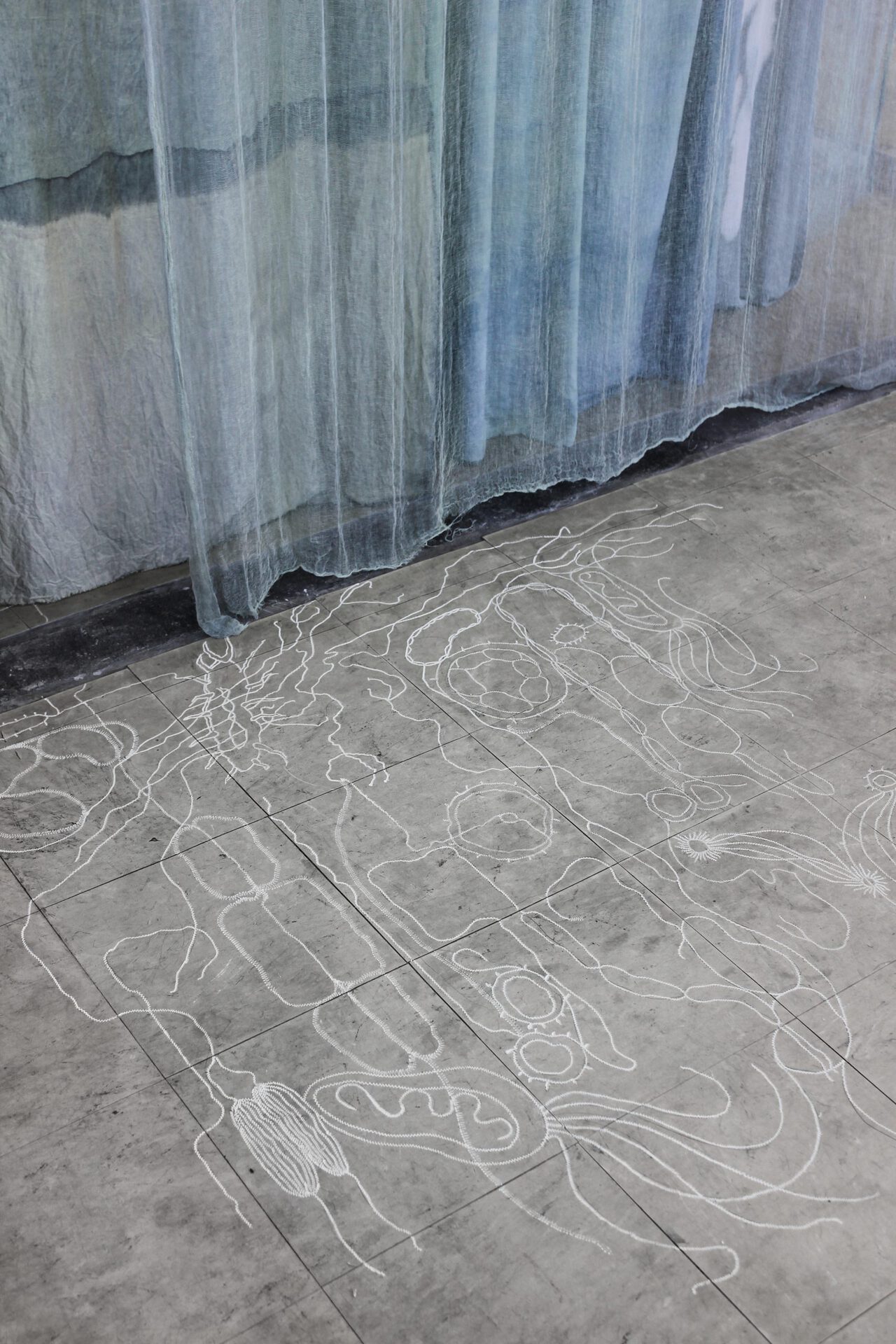 Julia Gryboś & Barbora Zentková, The Light that Finds the Spreading Wounds, 2020, hand–dyed medical gauze & cotton, linocut.