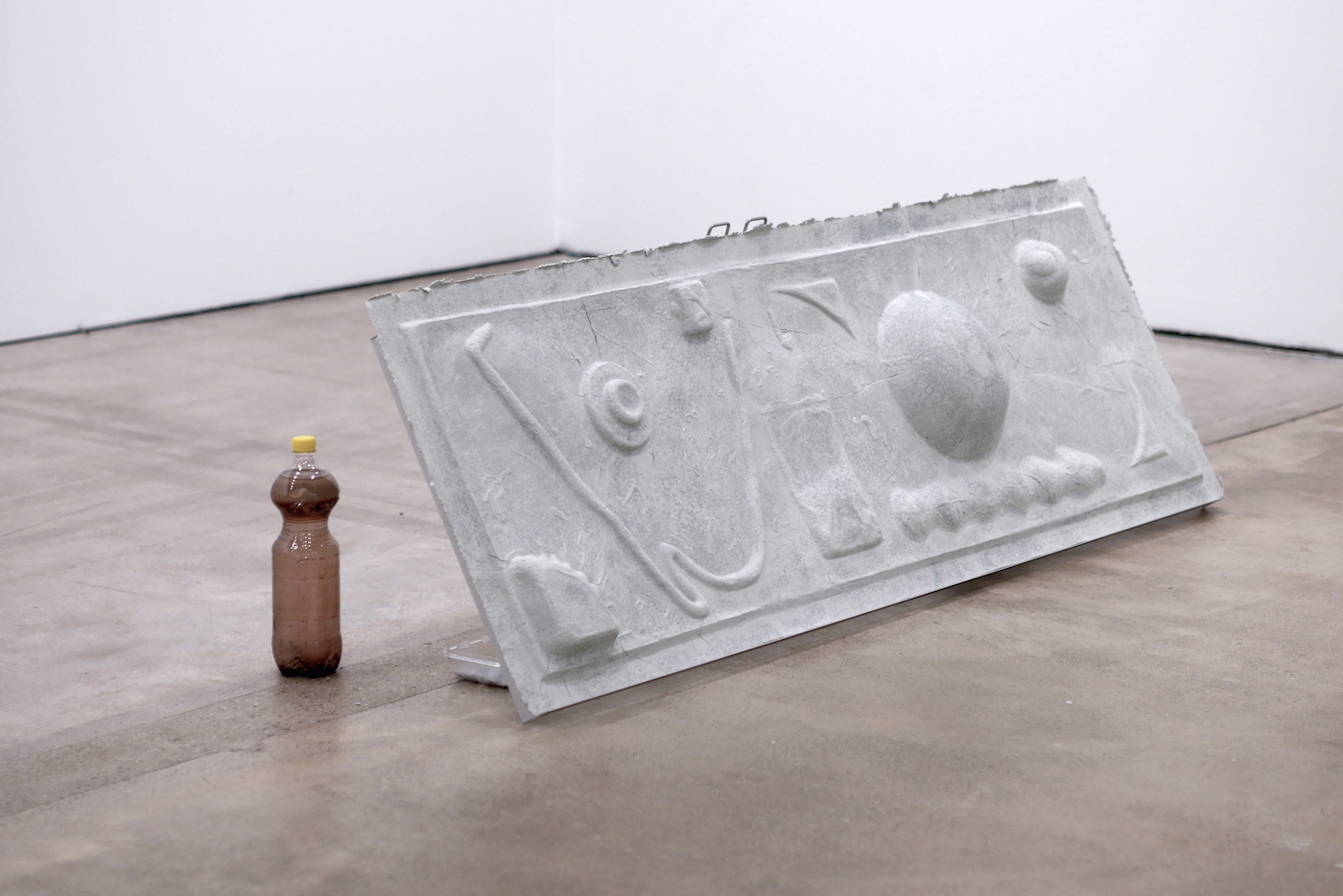 Since Long 2020, paper-pulp cast, aluminium, stainless steel, light cover, hand printed scarf, melted glass, denim, plastic bottles filled with paper pulp water, miscellaneous elements
