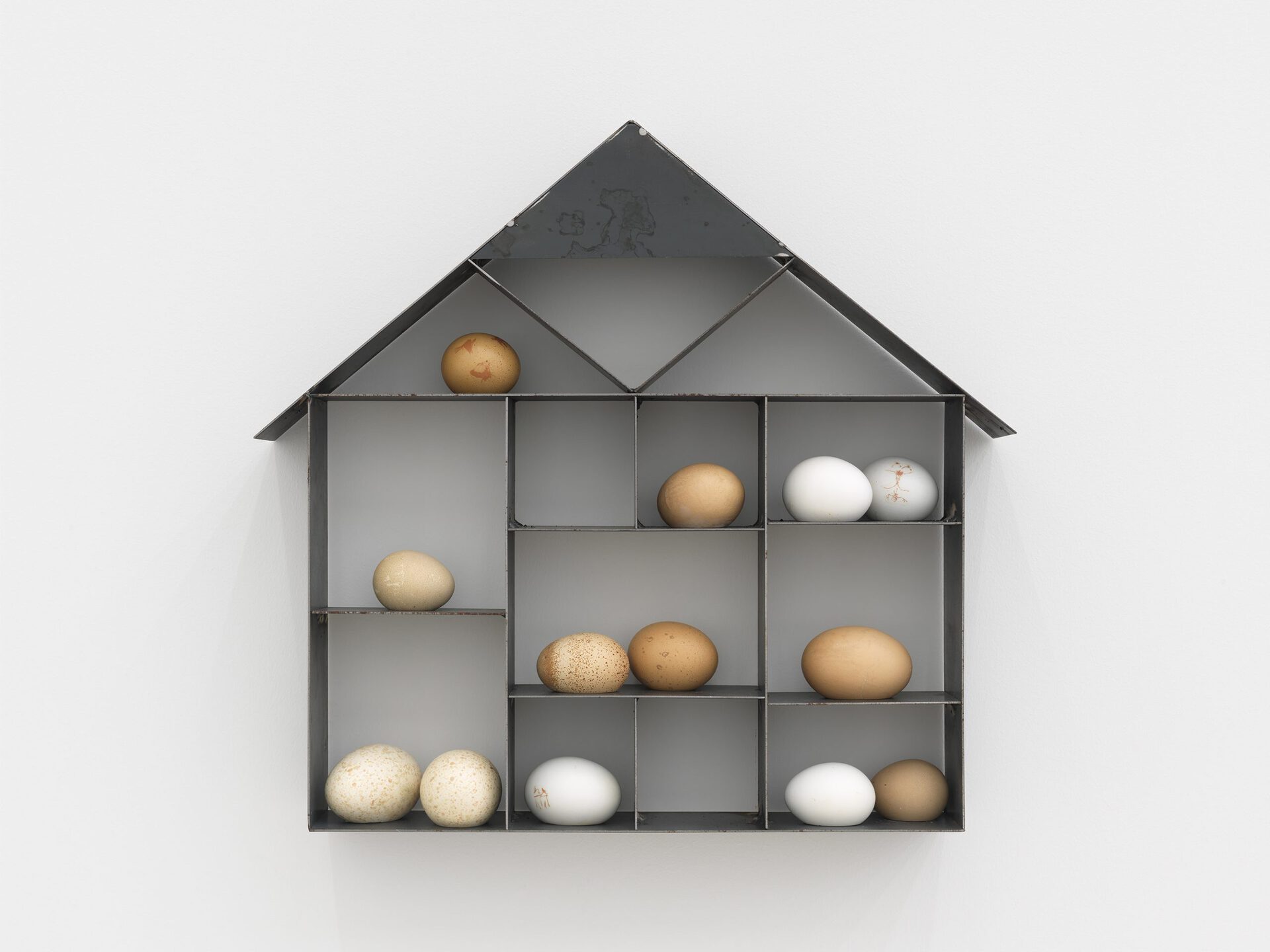 Lucia Leuci, UòvoteKa, 2020 Iron, eggs, temporary tattoos, plaster, 43x46x8 cm