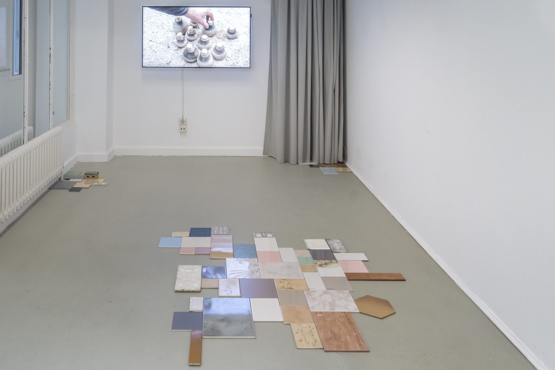 Yasemin Özcan, To Remember Everything is a Form of Madness 2/40, 2016, ceramic tiles, various dimensions; Earth, The Mother Of Us All, 2017, video