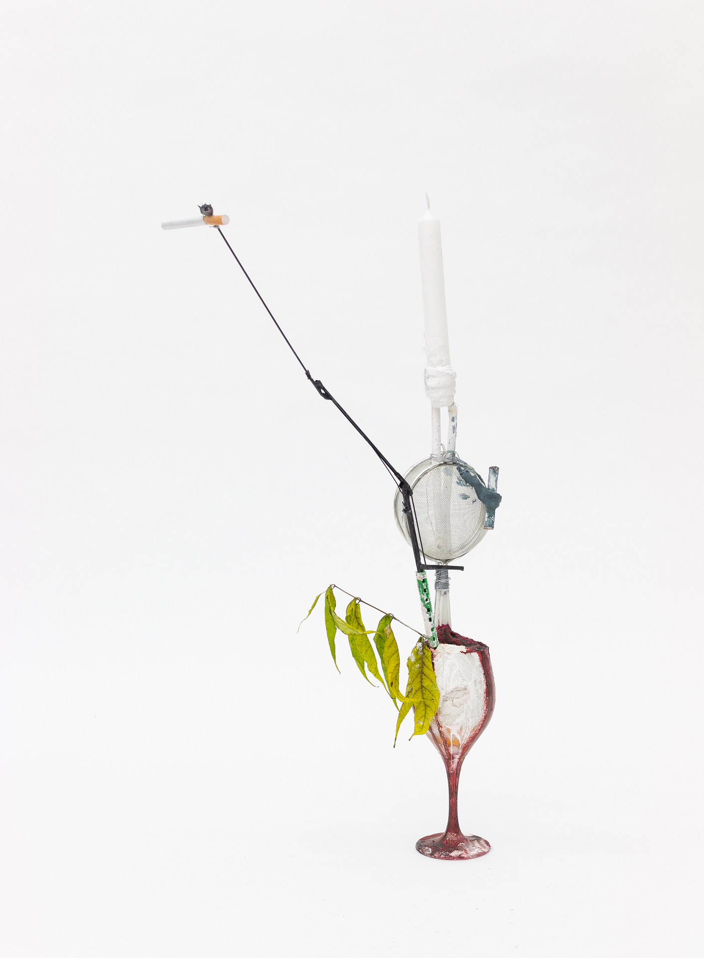 Sophie Schmidt, Kerzenständer mit Raucherhilfe, 2020, Glass, cigarette, cement, painted steel, sticks with leaves, matchbox, sieve, candle, wire, 43 x 15 x 15 cm