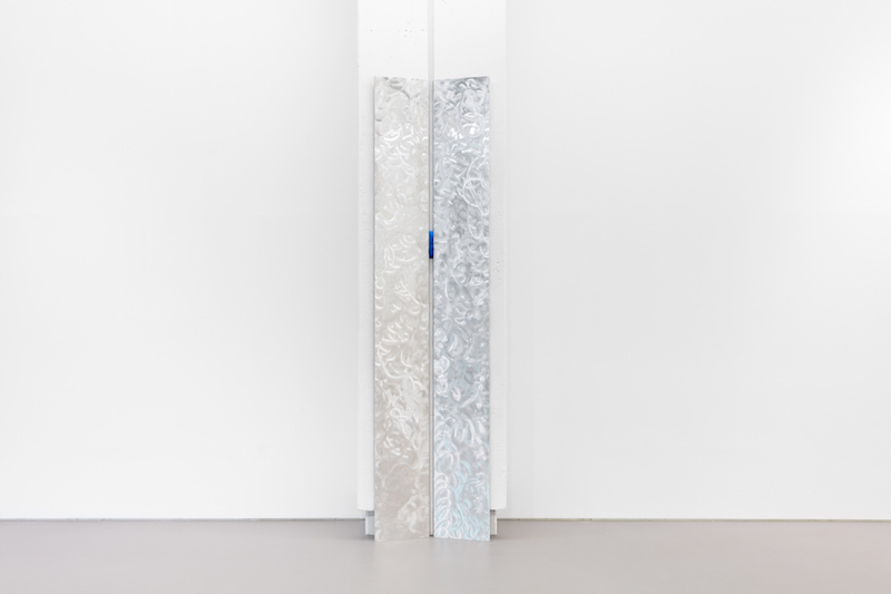 Marte Eknæs, Associate, 2020, brushed aluminium (two pieces), antistress ball, 280 x 36 x 4 cm (each panel)