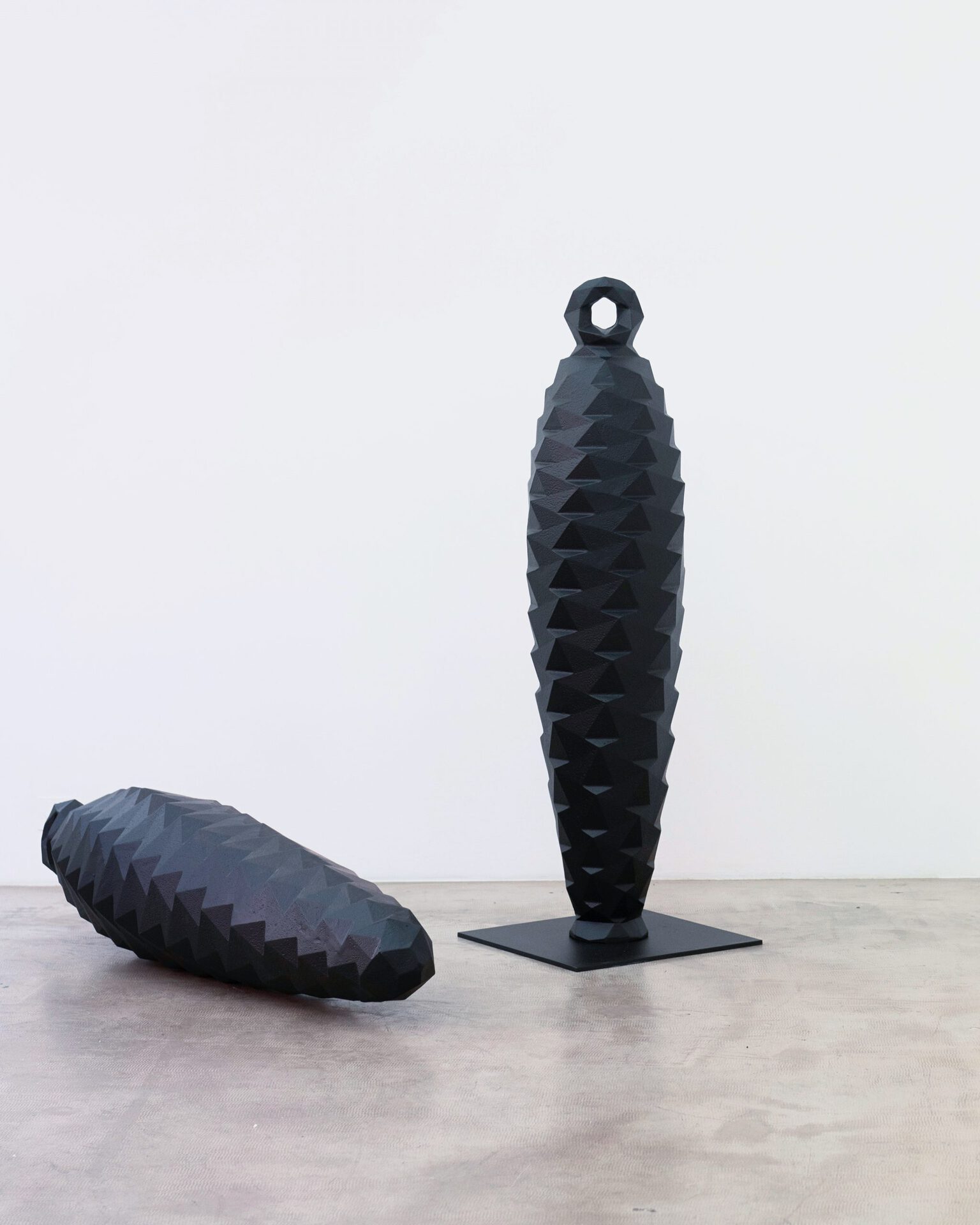 Stefan Strumbel ZAPFEN LIEGEND, 2020, cast iron powder coated black 152 x 40 x 40 cm
