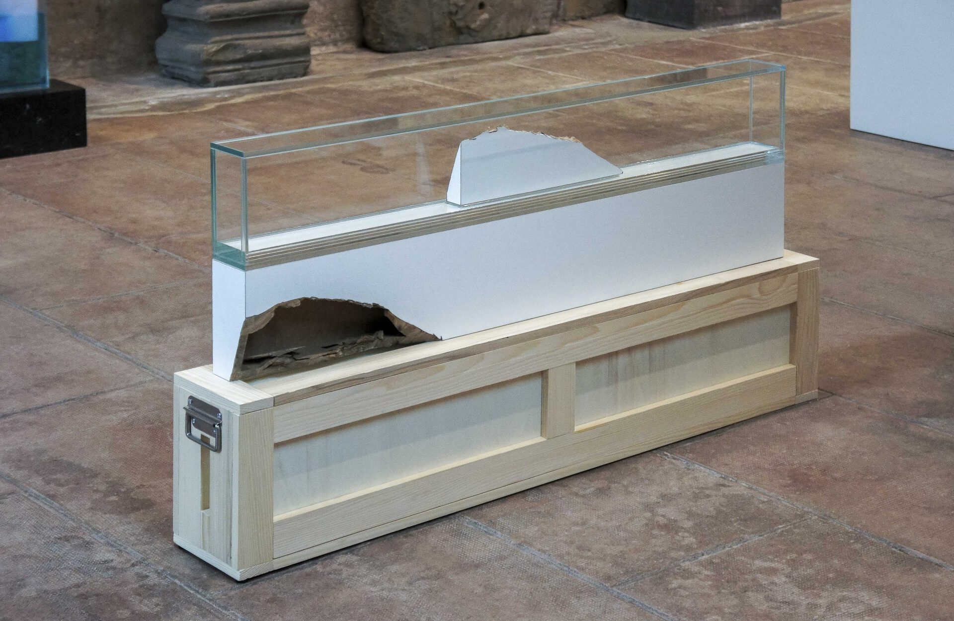 Broken Pedestal (09-27-2020 composition: medium, extra white glass, glycerin, borosilicate glass), 2020 Medium, extra white glass, glycerin, borosilicate glass 21 x 130 x 10 cm Installed on Broken Pedestal, Transport Crate, 2020 Fir, poplar, extruded polystyrene, stainless steel 28,6 x 139,6 x 19,6 cm
