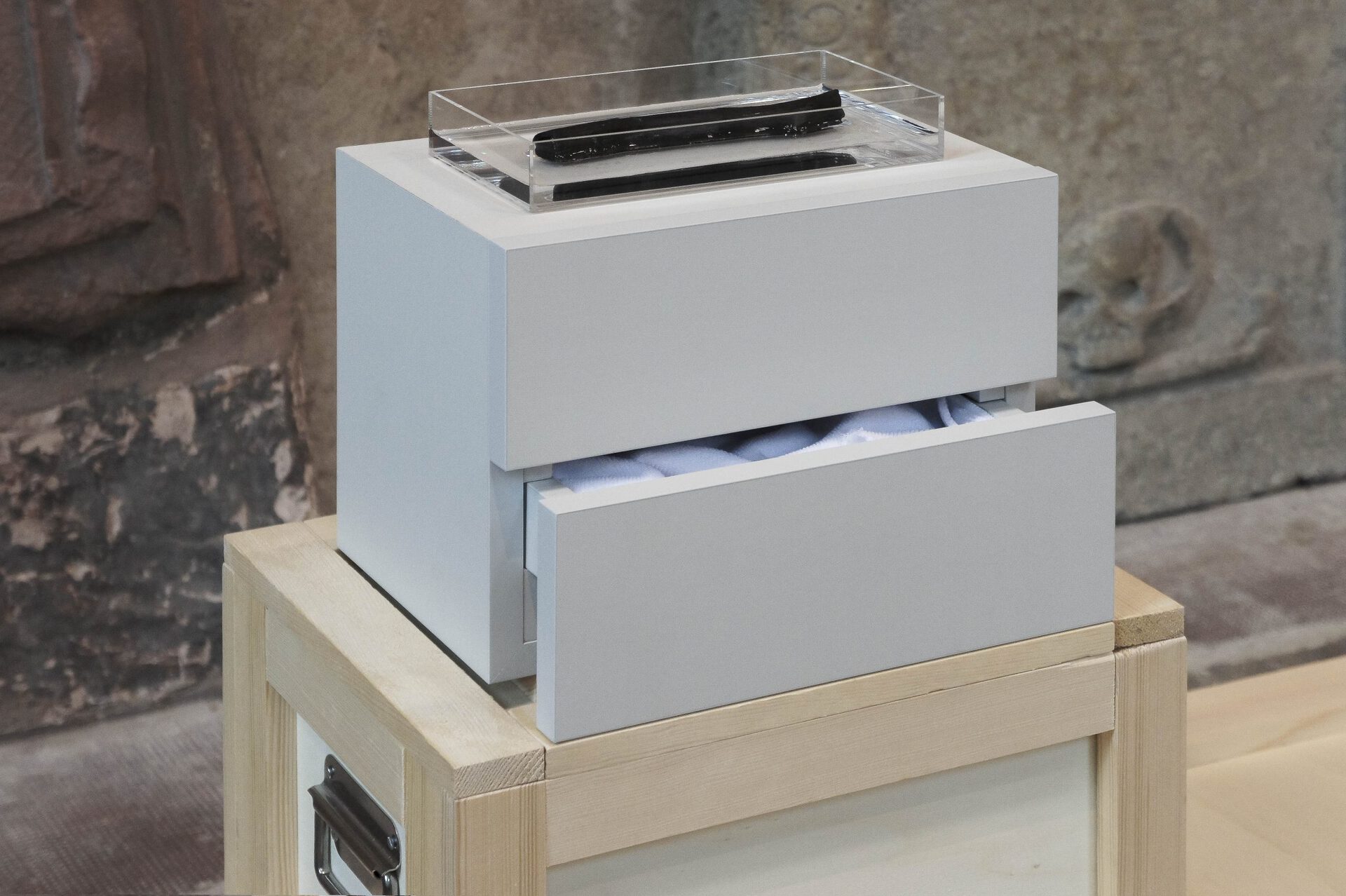 Exhibition and Storage Unit No.3A (Functional Pedestal Series), (09-27-2020 composition: microfiber, polymethyl metha- crylate, water, binchotan charcoal / Position 1-0), 2020 Medium, microfiber, polymethyl methacrylate, water, binchotan charcoal 25,4 x 32,8 x 21,8 cm (Details)