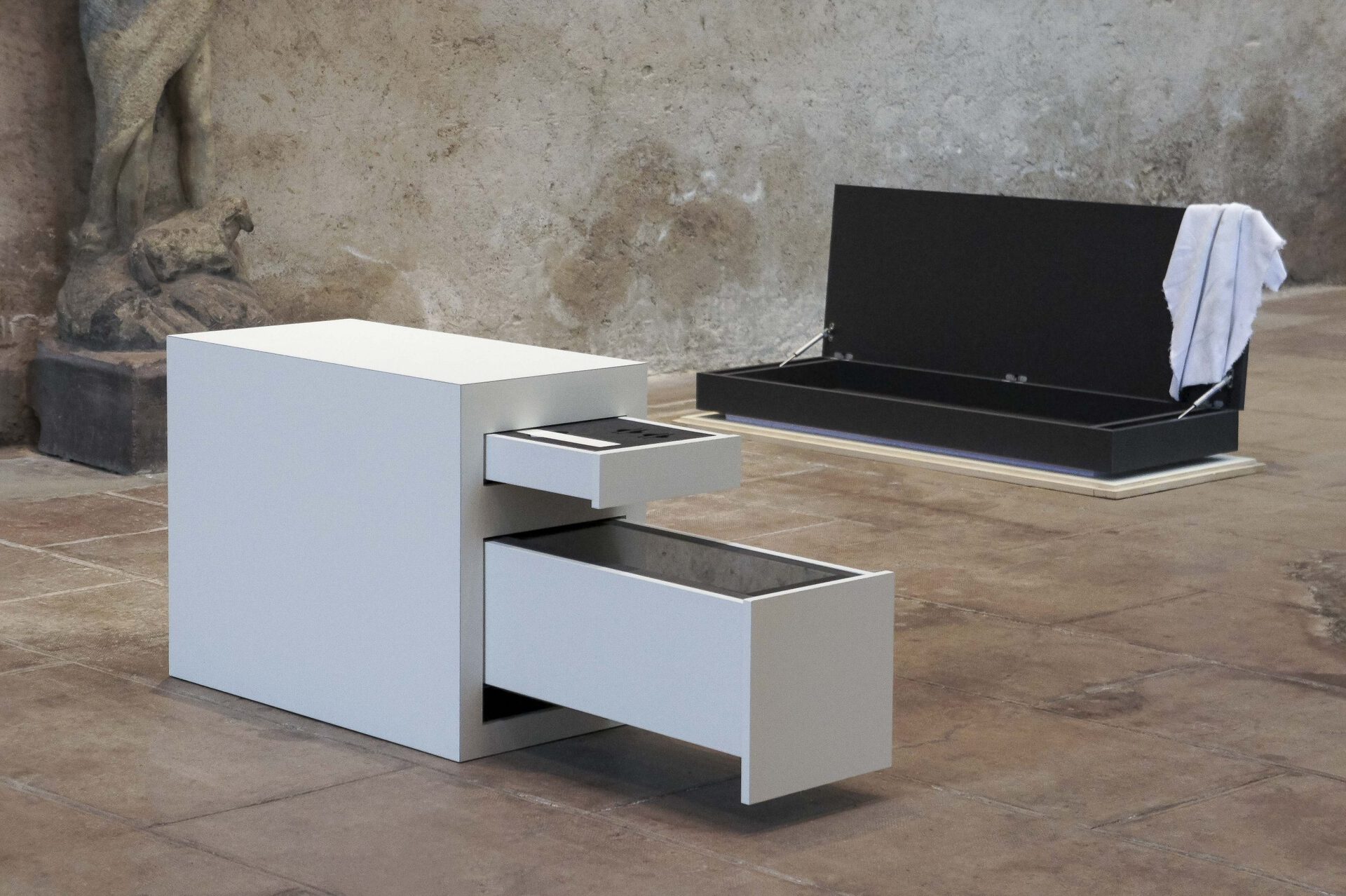 Exhibition and Storage Unit No.1 (Functional Pedestal Series), (Position 1-1), 2020 Medium, polyurethane, extra white glass, glycerin, borosilicate glass 60 x 150 x 40 cm (Right) / Exhibition and Storage Unit No.6A (Functional Pedestal Series), (09-27-2020 composition: fir, poplar, extruded polystyre- ne, microfiber, silica aerogel / Position 1), 2020 Fir, poplar, extruded polystyrene, medium, stainless steel, microfiber, silica aerogel 63,2 x 148,4 x 54,4 cm (Left)