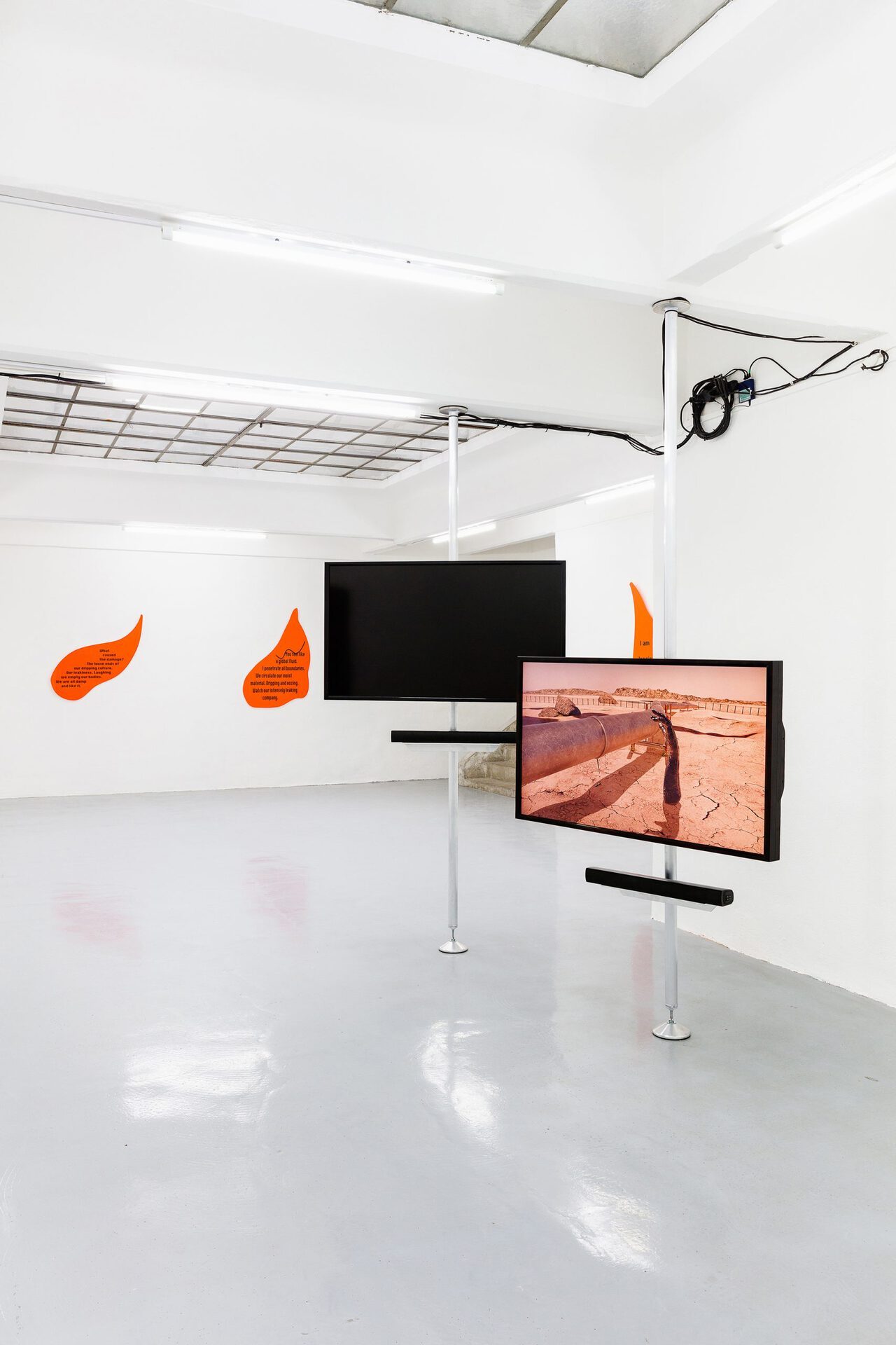 The Leaking Bodies Series, 2020, 3 channel video installation, 06:30 min, sound, loop, animation, orange acrylic glas, black vinyl installation view, Gianni Manhattan