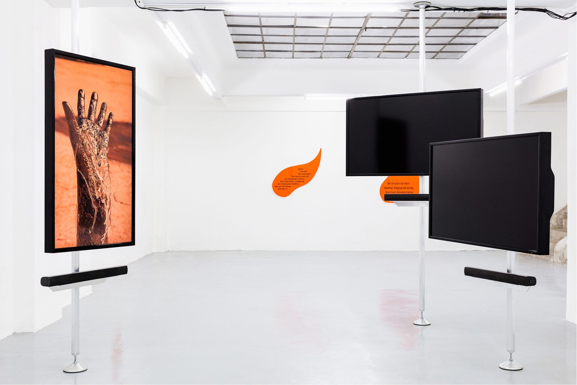 The Leaking Bodies Series, 2020, 3 channel video installation, 06:30 min, sound, loop, animation, orange acrylic glas, black vinyl installation view, Gianni Manhattan