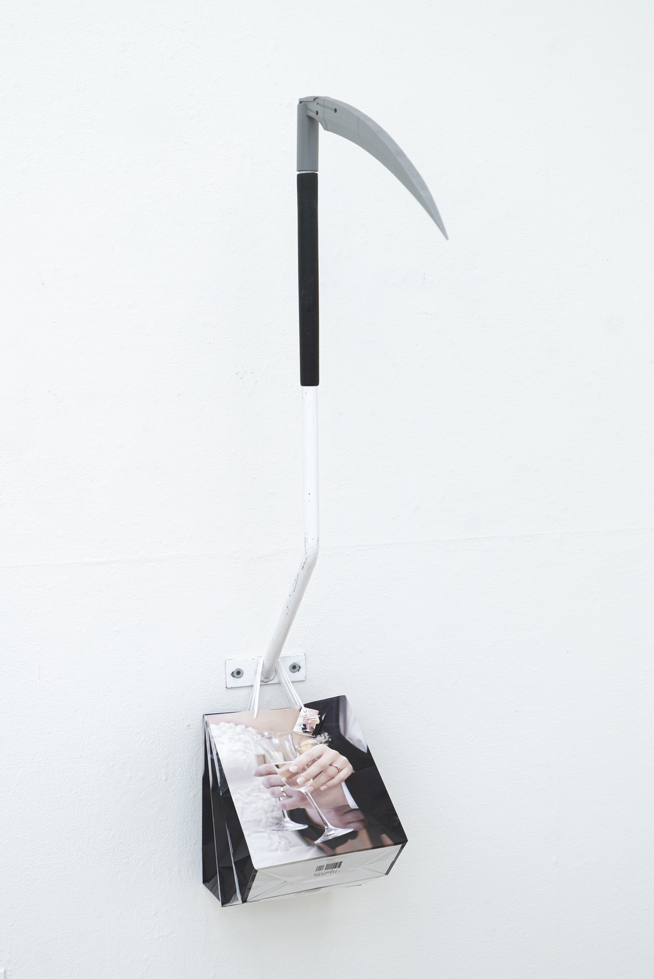 Graham Wiebe, A Small Wedding, 2020, gift bags, exercise machine fragment, 3D printed scythe, 48 x 11 x 32 in