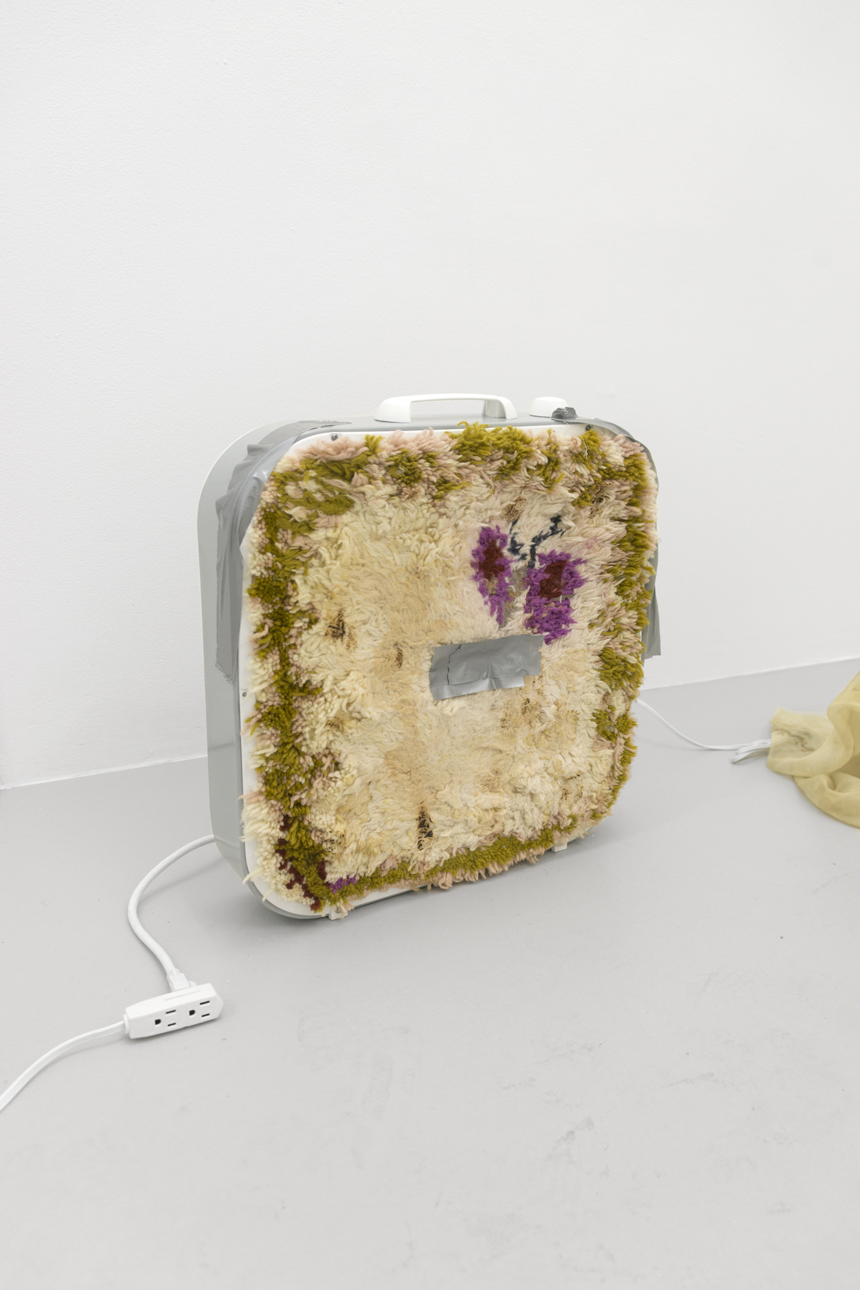 Justin Chance, Monday, 2020-2021, Piled, burned and wet-felted wool, cigarette smoke, Hot Toddy, duct tape, box fan, 20.5 x 20.5 x 4.5 in.