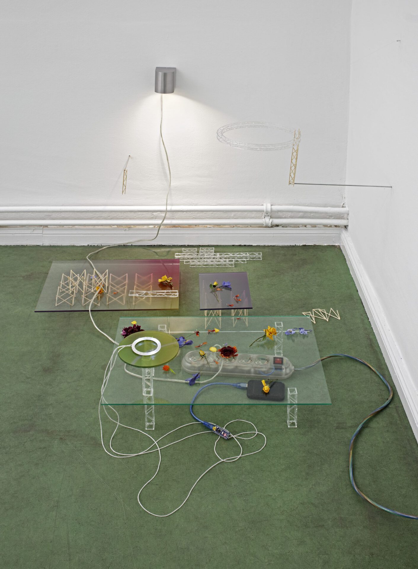 Nile Koetting – Scene 2, 2021 Plexiglas LED, Spotlight, power adopter, wood, plastic, flower, powerbank Size Variable