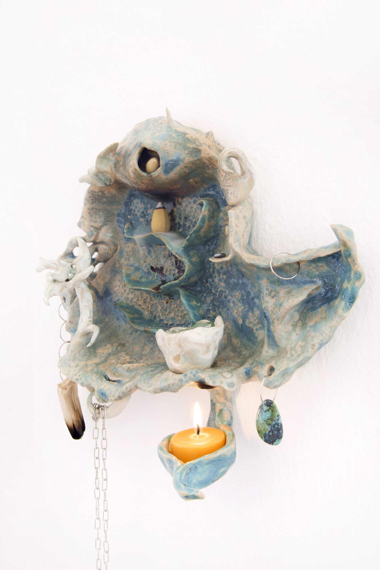 Maya Hottarek Facing a Young Padawan, detail 2021 Glazed ceramic, palo santo, essential oils, beeswax, chrysocolla, metal, lighter, water