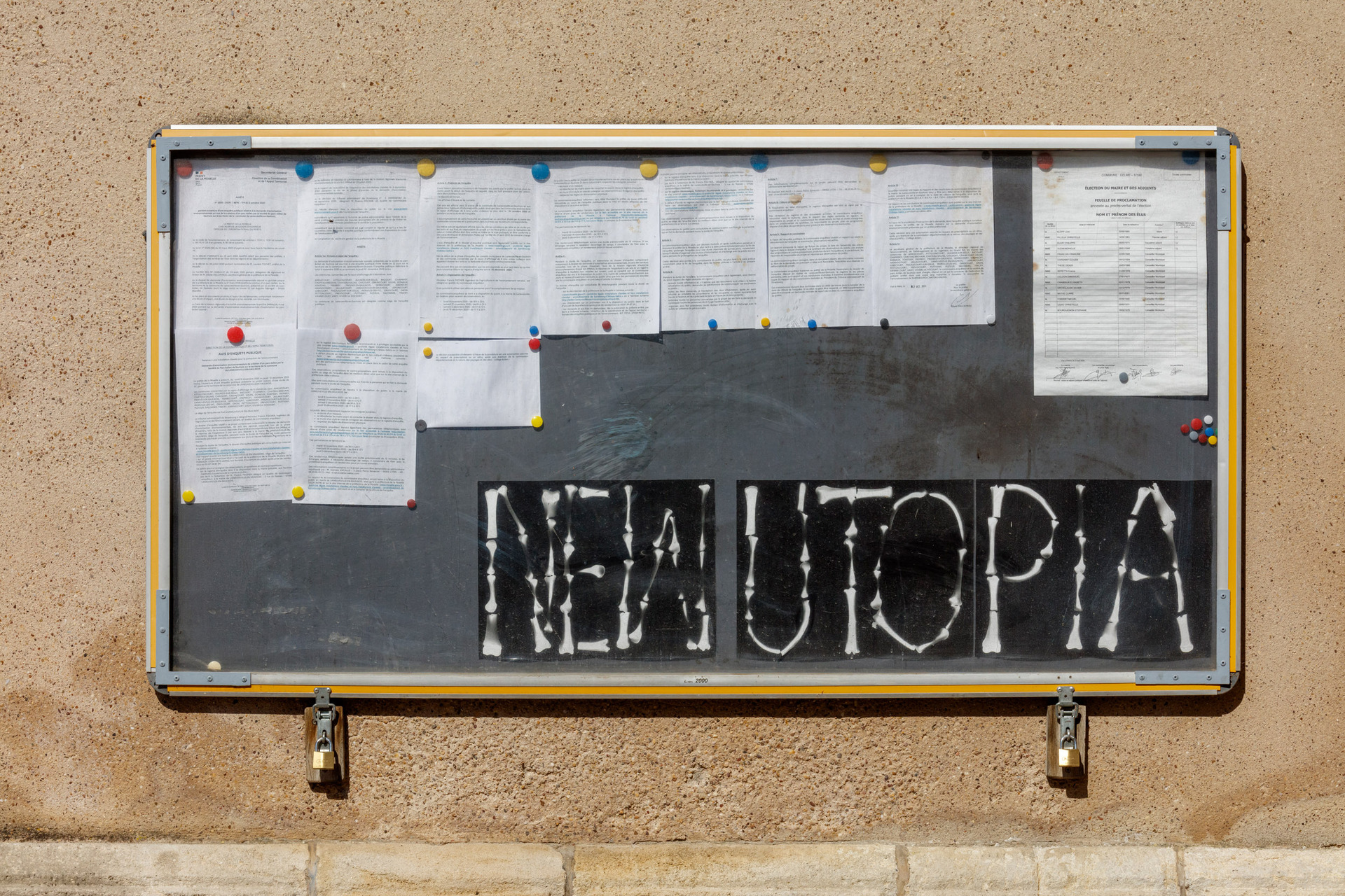 Gina Folly, NEW UTOPIA, 2021, photogram of animal bones, Aluminium Notice Display locked.