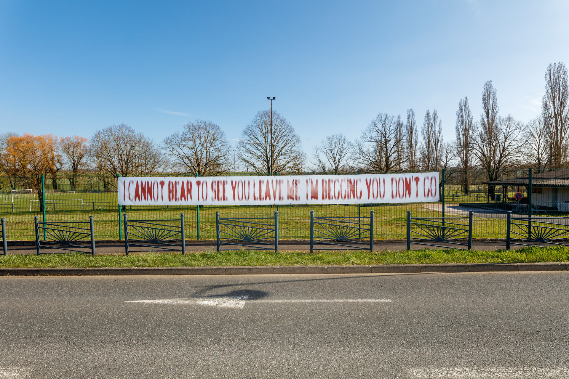 Zuzanna Czebatul, I Can Not Bear to See You Leave Me , 2021, print on PVC tarp, 90 x 1000 cm.