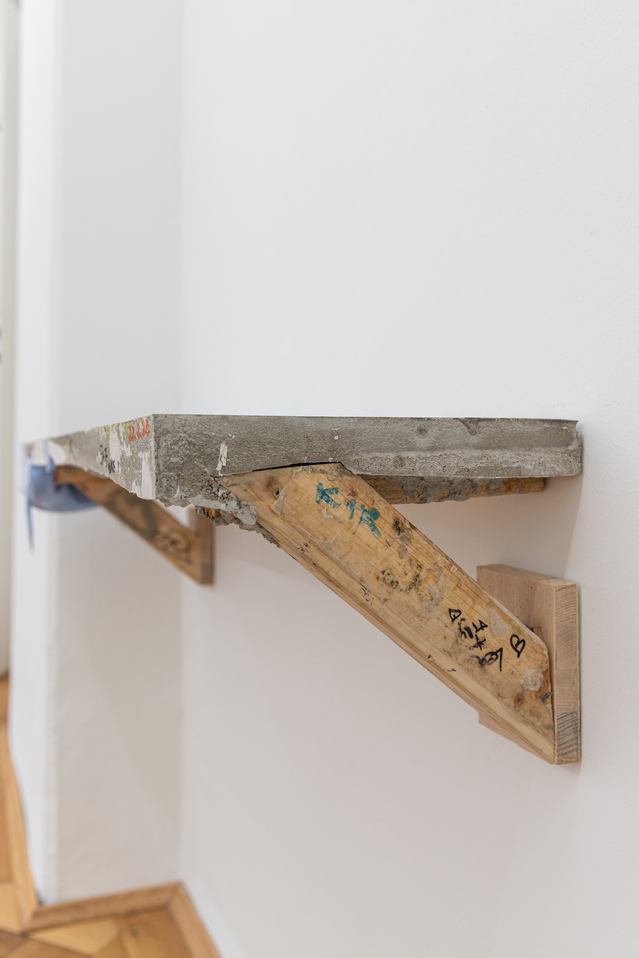 Patrick Ostrowsky, "benching #2", 2021, concrete, plaster, construction steel, epoxy resin, spray paint, felt-tip pen, polyurethane foam, pigments, wood, 28 x 96 x 24 cm