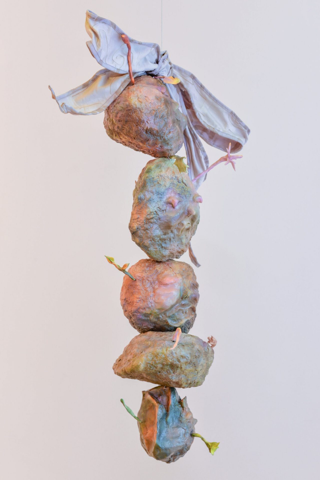Anna Reutinger, Trash babies. Plastic waste, paper bags, flour, paper clay, acrylic, upholstery fabric, 2021