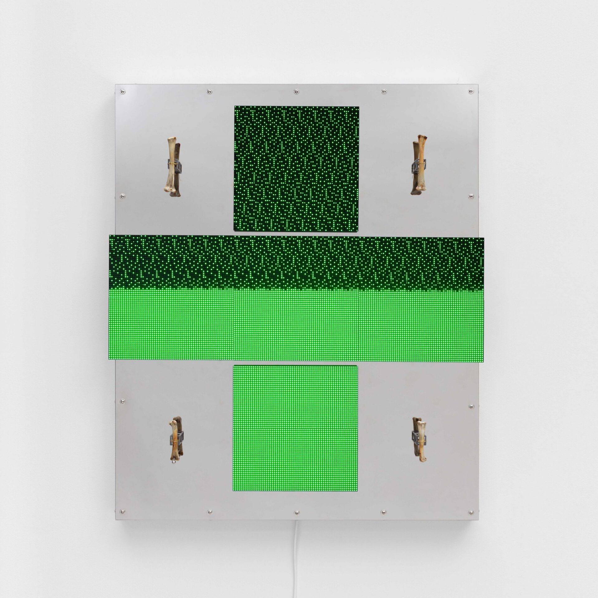 Mathis Altmann, Powerlifestyles (versions), 2021, LED matrix screen, video loop 1.40 mi., stainless steel mirror, plastic, chicken bones, piercing, 90 x 75 x 12 cm
