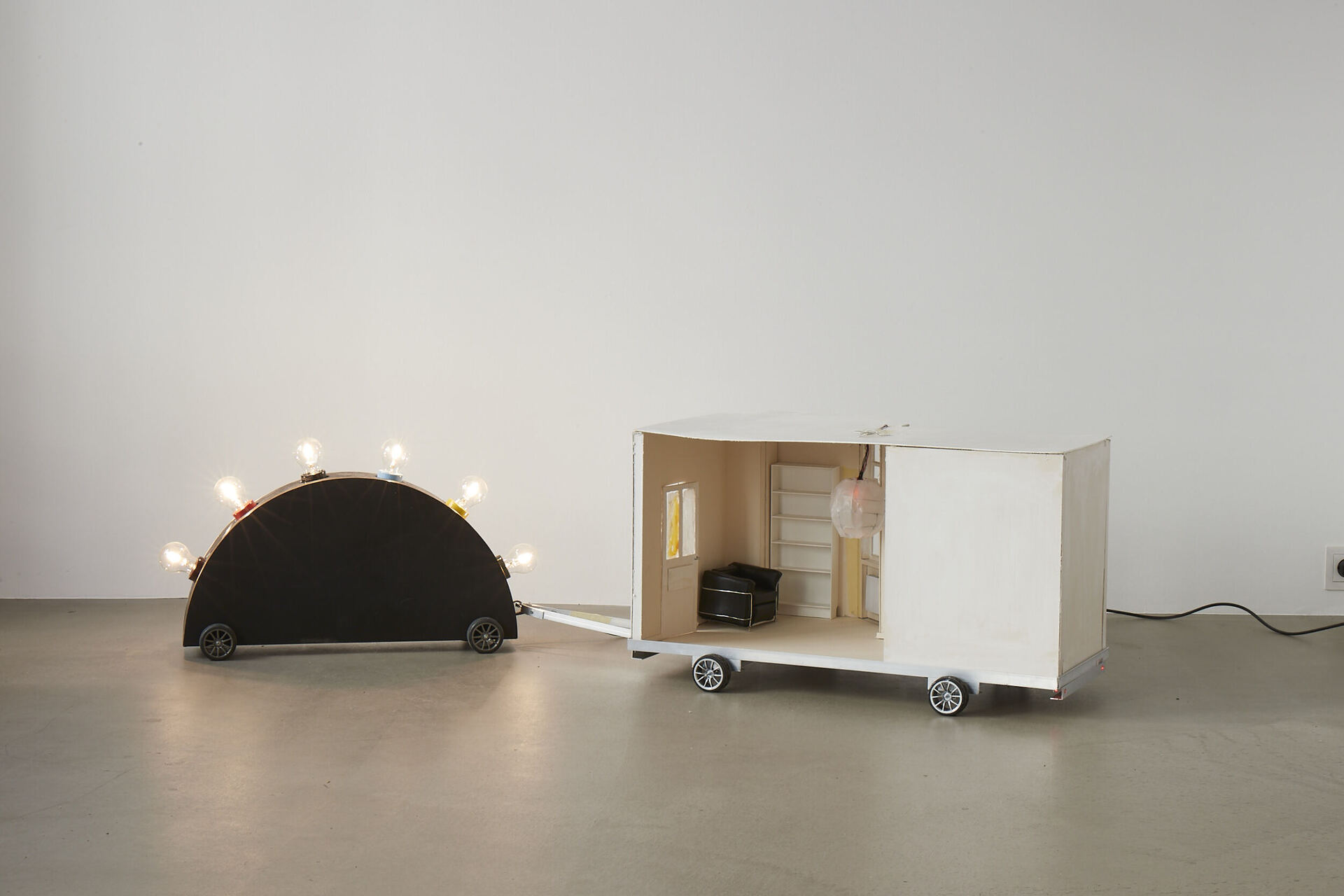 Frieder Haller, Memphis Blues (after Martine Bedin) V, 2021 Wood, coating, electrical wiring, six light bulbs, board, aluminium, leather, wire and model car wheels 43,6 × 176,5 × 53 cm / 17.1 × 69.4 × 20.8 inches