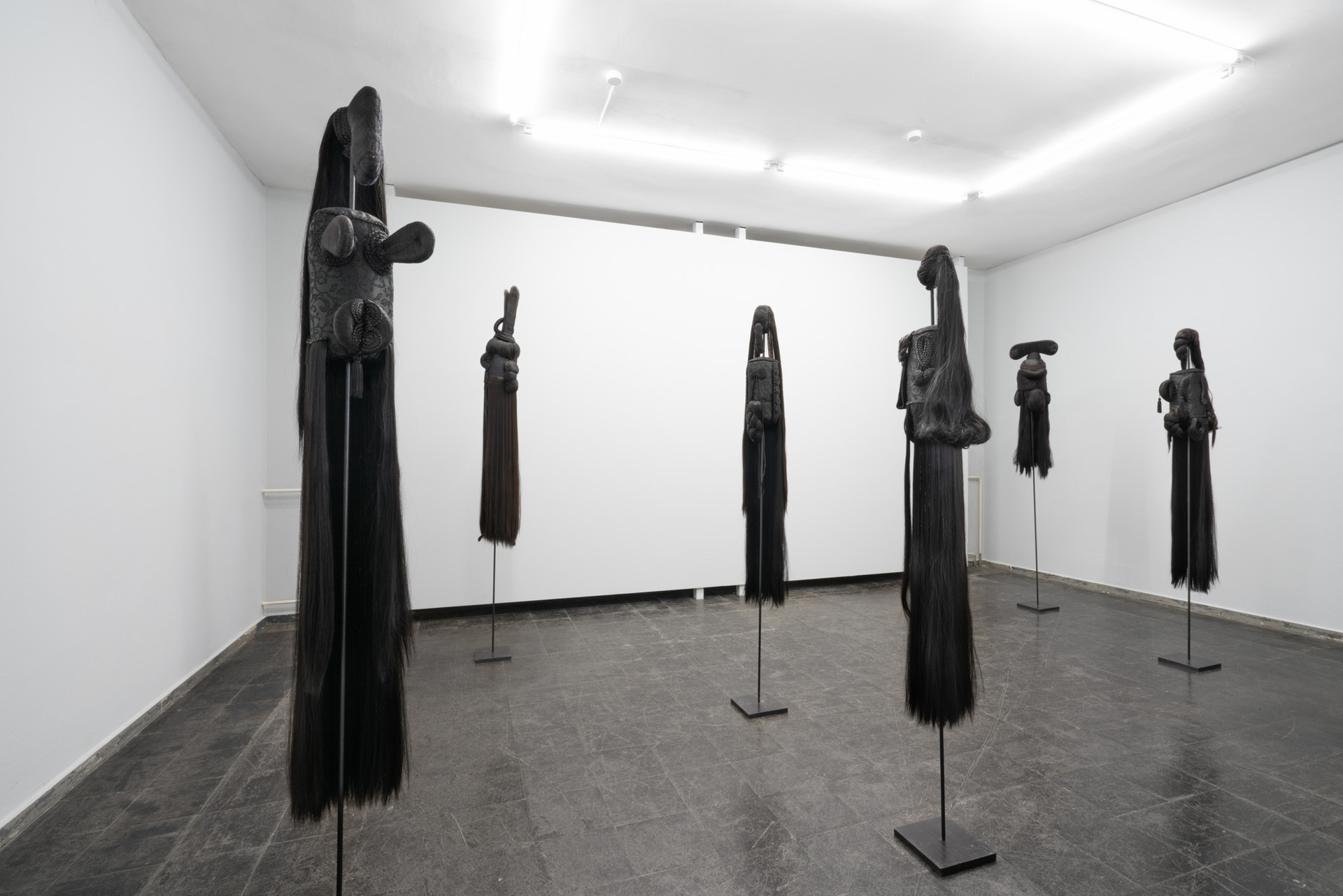 Installation view of sculptures Synthetic hair, fabric, fiberfill and metal   From left to right MARIANNA IGNATAKI, Come to Me (Rose), 2018 Synthetic hair, fabric, fiberfill and metal 189x20x35cm  MARIANNA IGNATAKI, The Blind Boy, 2018 Synthetic hair, fabric, polyester fiberfill and metal 215x23x26cm  MARIANNA IGNATAKI, Le Parisien, 2018 Synthetic hair, fabric, polyester fiberfill and metal 190x20x20cm  MARIANNA IGNATAKI, The Pretty Lady, 2018 Synthetic hair, fabric, thread, polyester fiberfill and metal 183x20x20cm  MARIANNA IGNATAKI, The Duck, 2018 Synthetic hair, fabric, polyester fiberfill and metal 202x34x26cm  MARIANNA IGNATAKI, The Witch, 2018 Synthetic hair, fabric, polyester fiberfill and metal 188x20x32cm