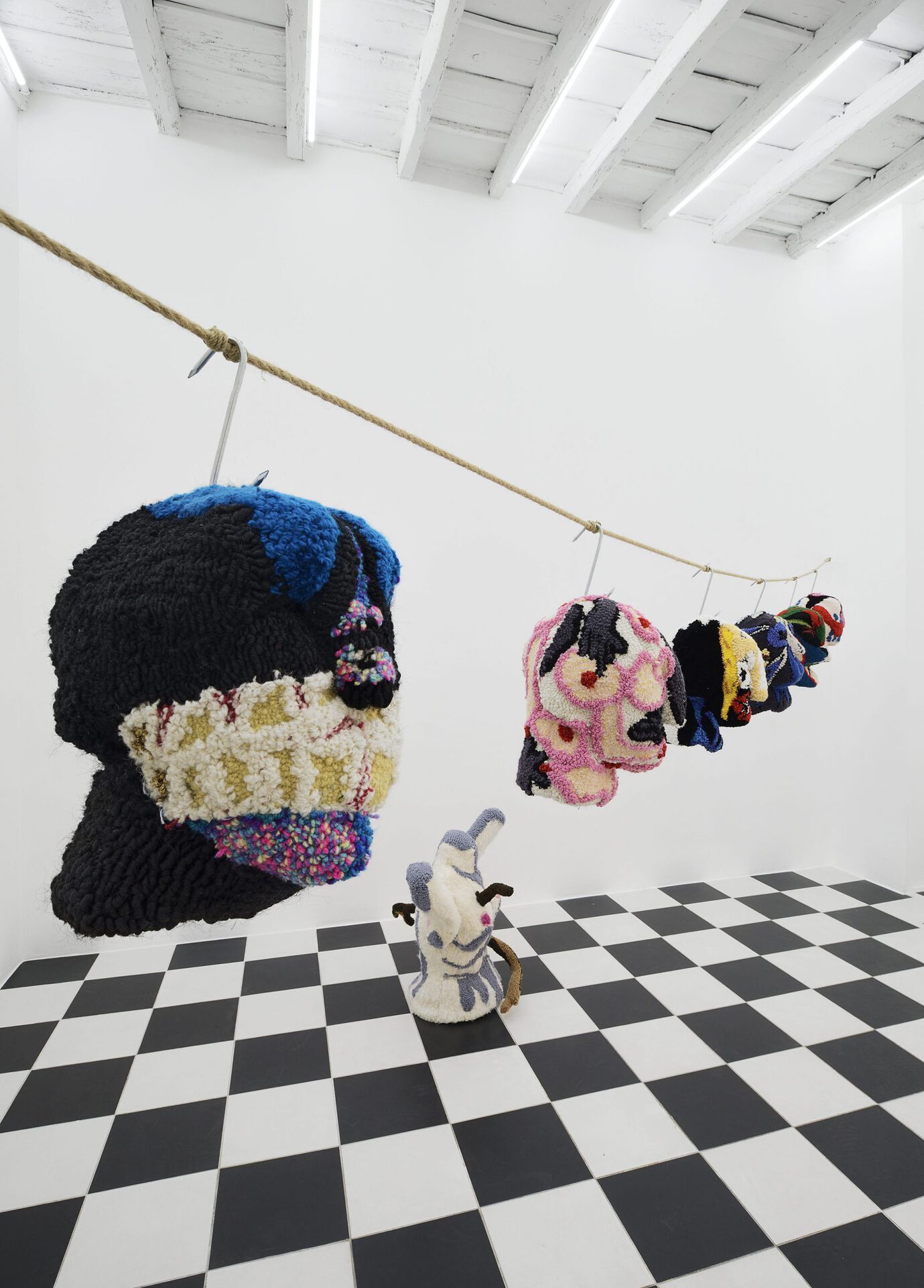 05. Anna Perach, Seven Wives, 2020, tufted yarn, artificial hair, metal hooks, hemp rope, size varies, Courtesy of ADA, Rome