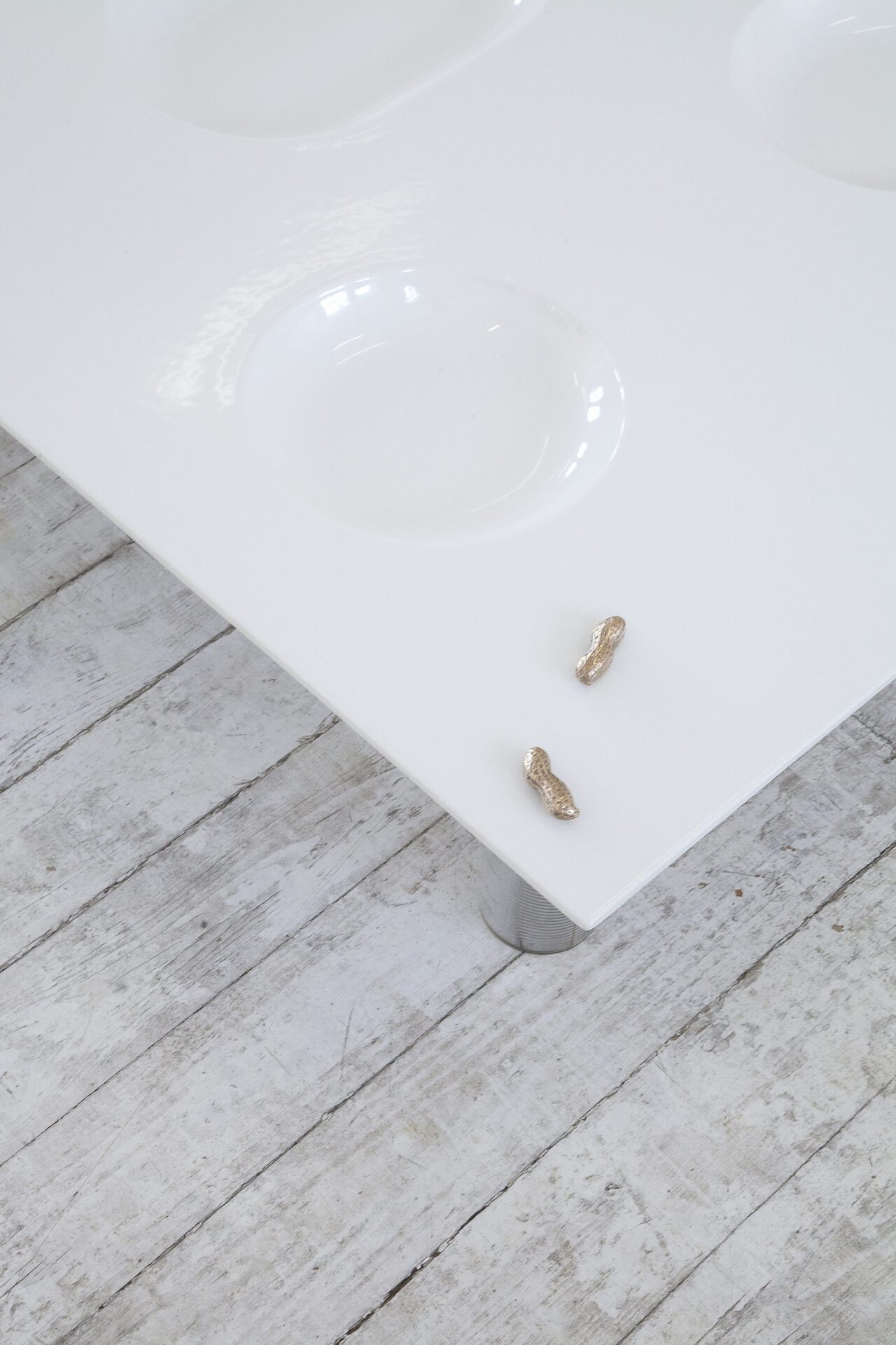 Anna Paul, Plate Table (detail, with Peanuts, 2021, bronze cast), 2021, ceramics, 120 x 70 x 5cm