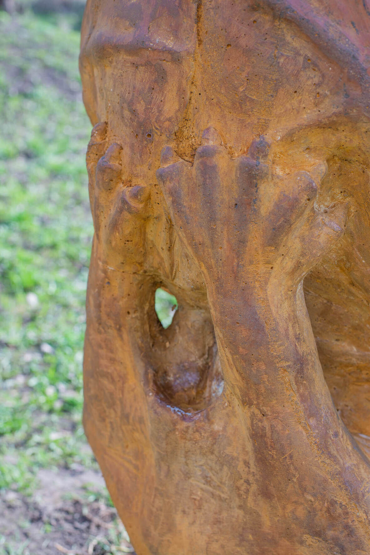 Mykolas Sauka, Embryos, 2020, rusted concrete, 120 x 500 x 300 cm
