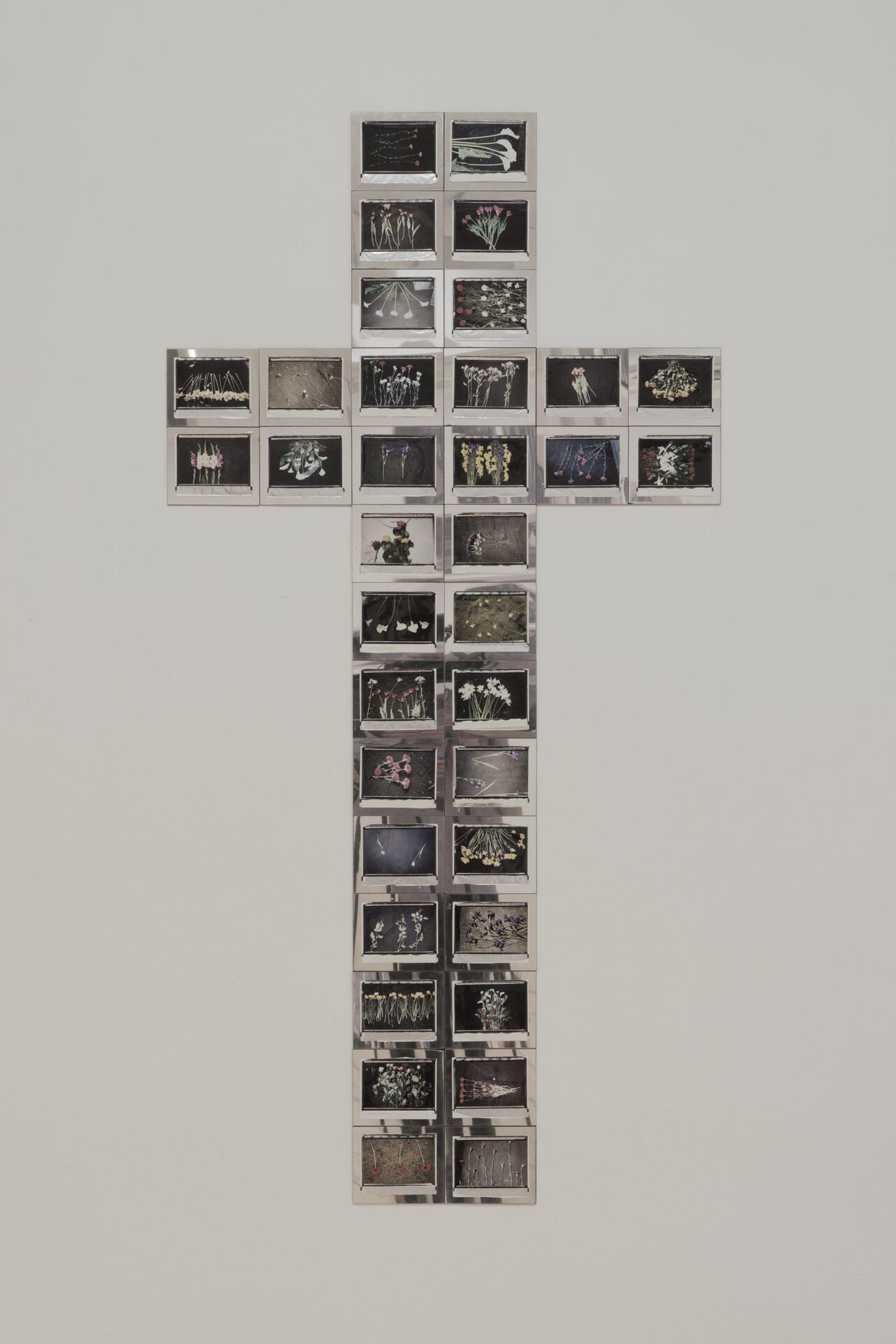 Nata Sopromadze, Grave flowers, 2016, Installation with 26 polaroids on mirror frames, each 10,5x 3,5cm