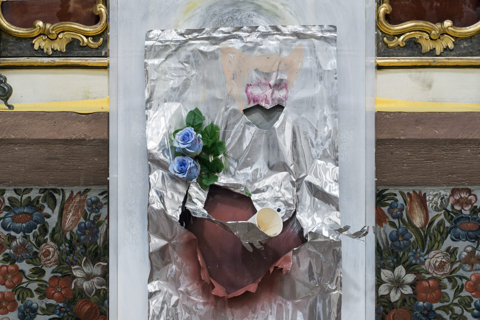 Jesse Darling, Our Lady Batman of the Empty Center (Temporary Relief), 2018 spray paint and ink on aluminum and wood, paper cup, cemetery flowers, gold leaf, finger sheaths, ECG stickers, Band-Aid wrappers, Perspex 134 × 65 × 25.5 cm detail  courtesy of the artist and Arcadia Missa Gallery, London