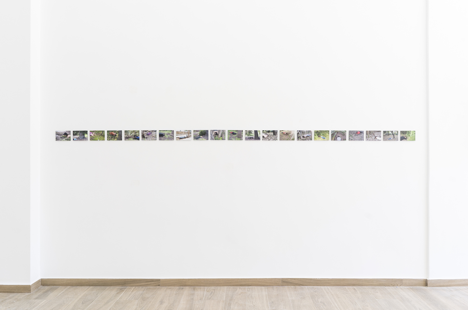 Regina José Galindo, Roots, 2015, Perfomance Documentation, 15 Prints, Photo Print on Aluminium Dibond, 15 x 10 cm each, 3 + 2 AP, Courtesy of the artist and Proyectos Ultravioleta, Guatemala Callirrhöe, Athens, Photo: Alexandra Masmanidi, 2021