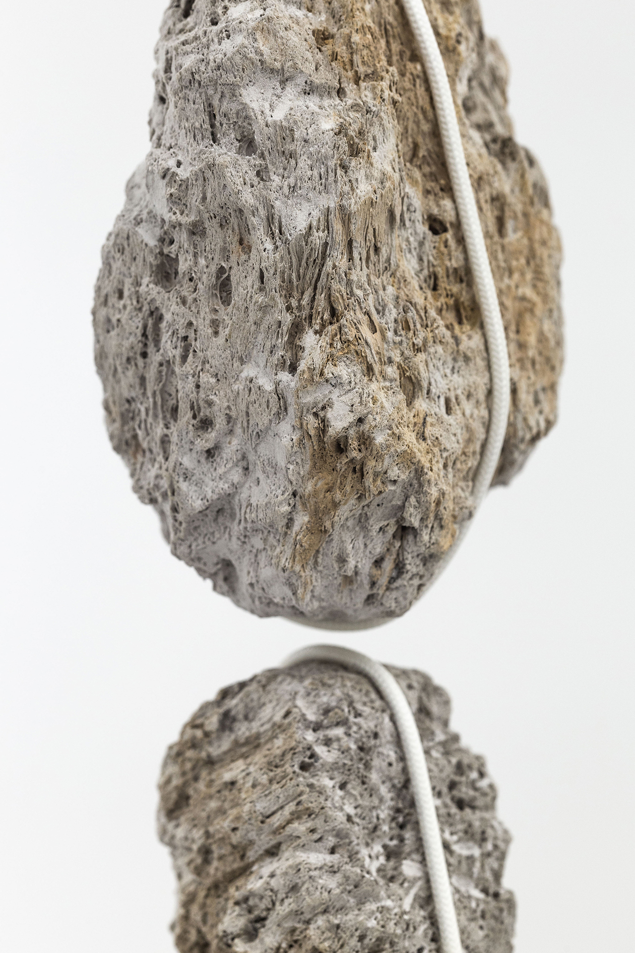Romain Dumesnil, Lapso, 2017, Magnetized Vulcanic stones, rope, variable dimensions