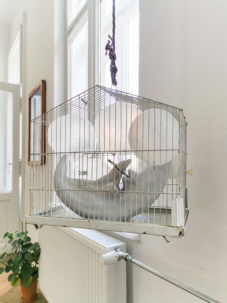 Kamil I, "Moon", 2020 clay, silver, found object (cage),40x40x25 cm