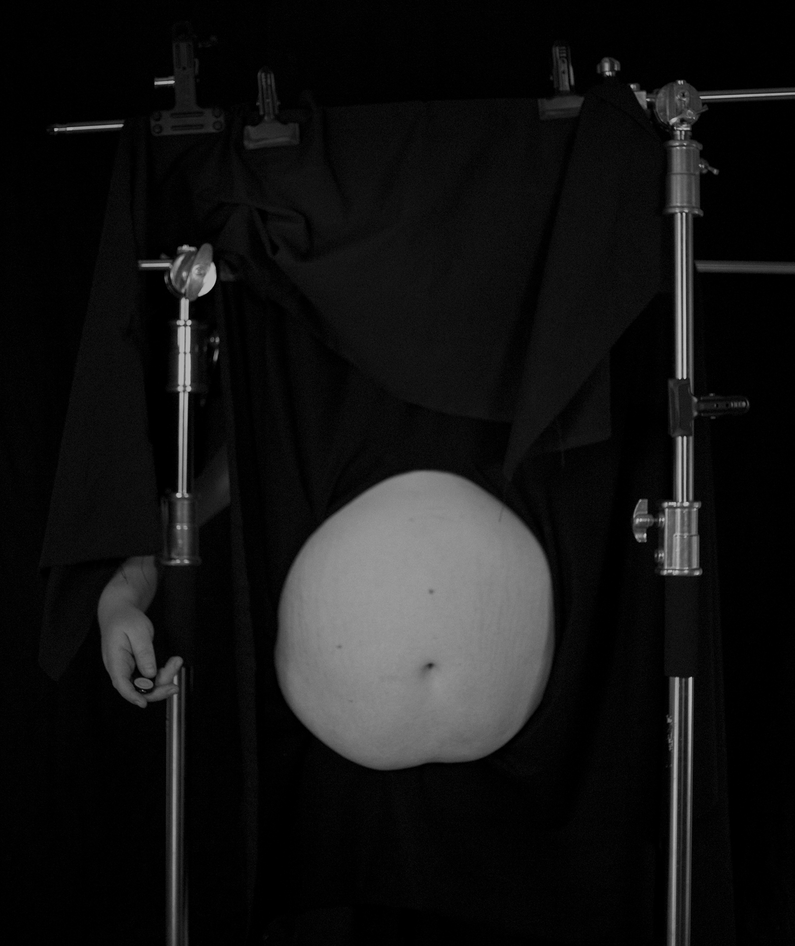 Tore Hallas: Thanatos 1 & 2, 2021. C-print, frama, reflective glass, fabric backdrop, podium
