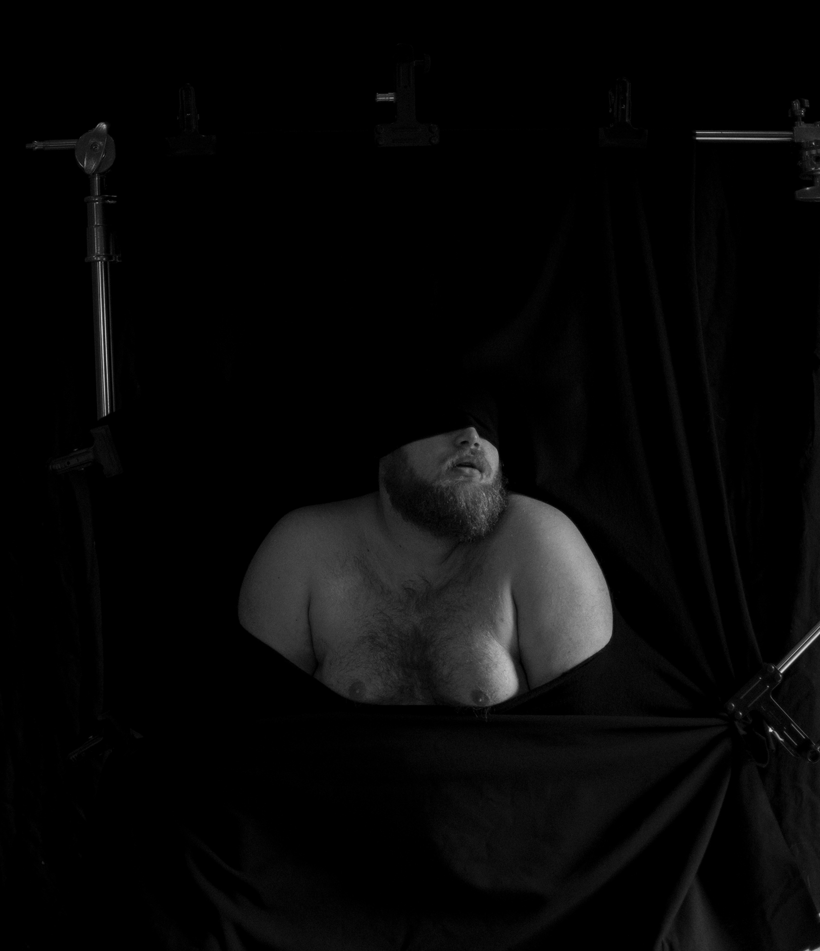 Tore Hallas: Thanatos 1 & 2, 2021. C-print, frama, reflective glass, fabric backdrop, podium